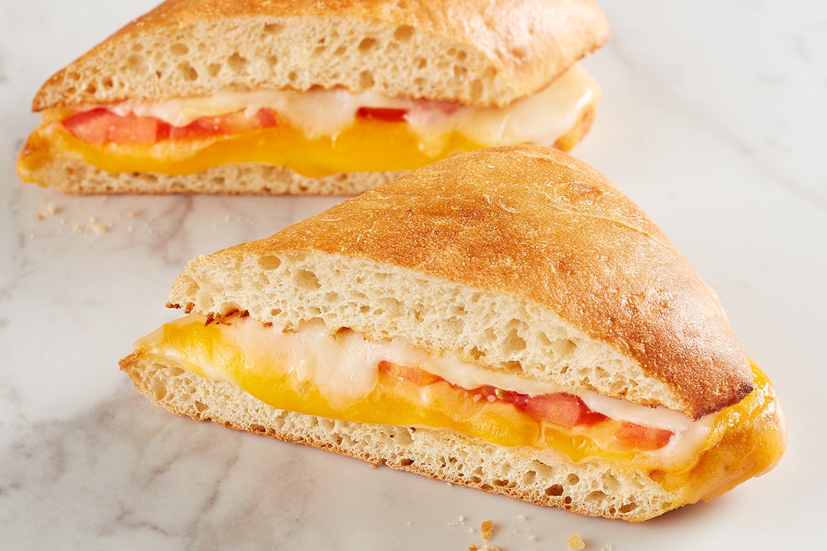 Order Four Cheese Melt food online from Mcalister's Deli store, Hot Springs on bringmethat.com