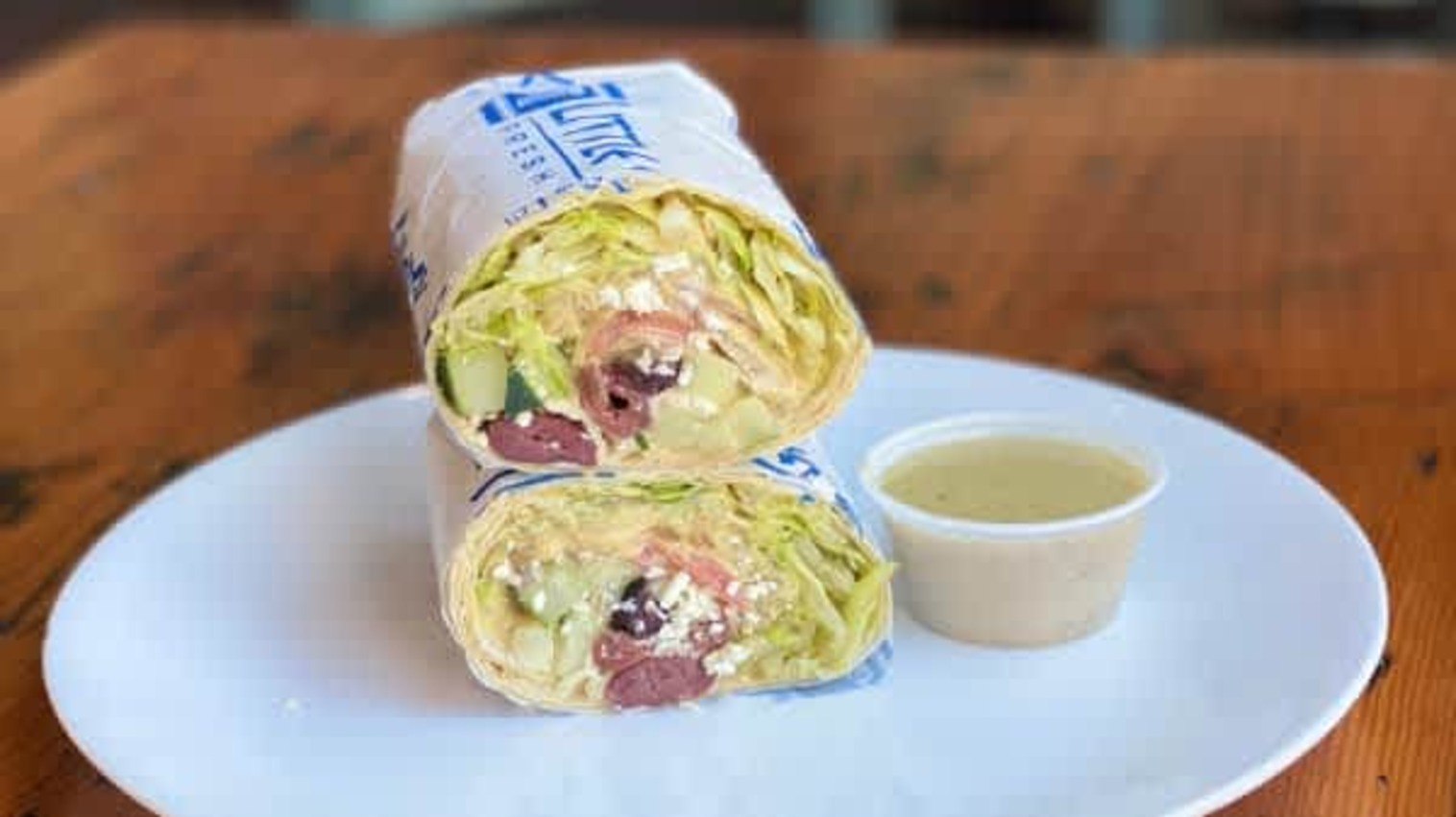 Order VEGGIE WRAP food online from Little Greek Fresh Grill store, Youngstown on bringmethat.com