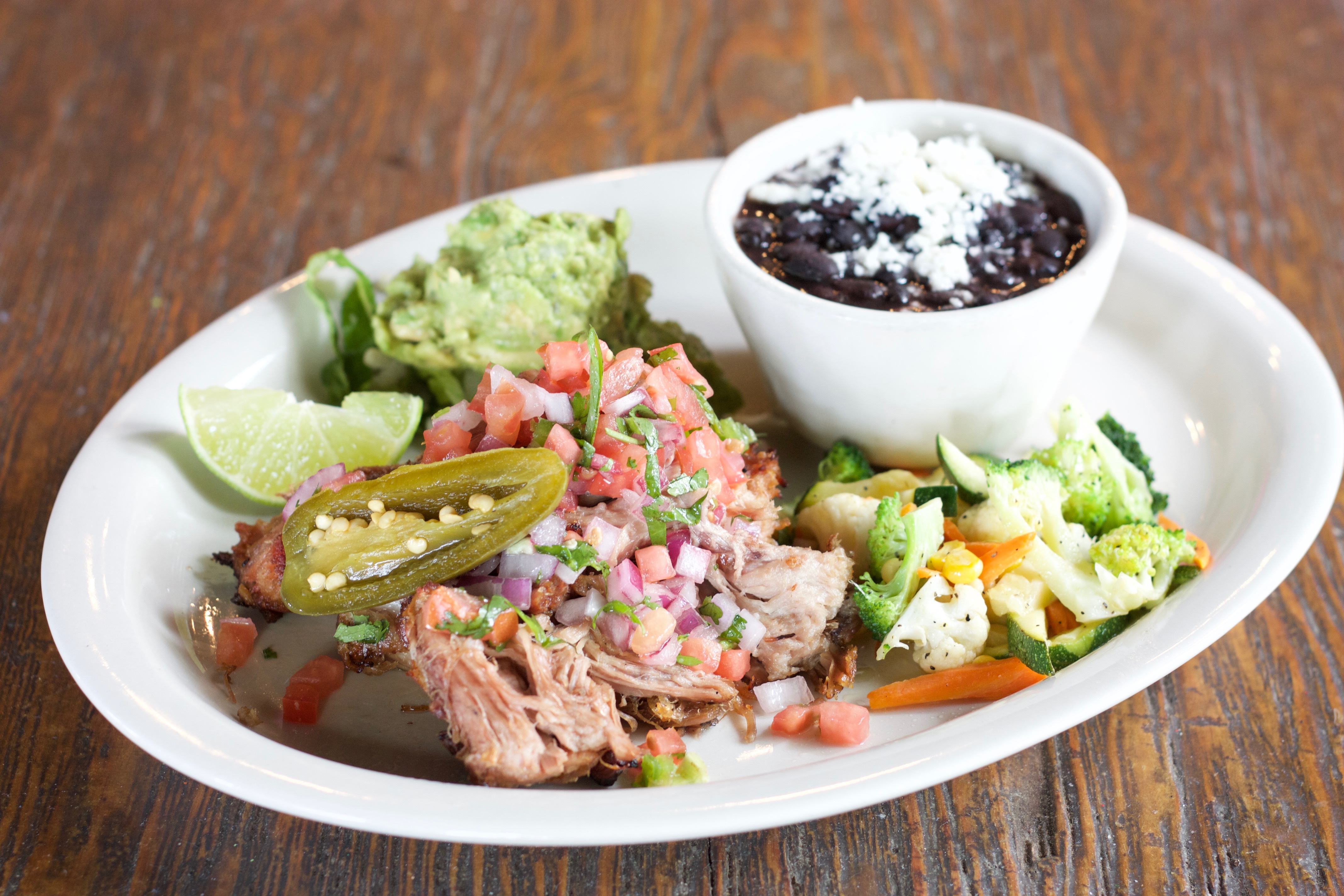 Order CARNITAS food online from Los Sombreros Mexican Restaurant store, Scottsdale on bringmethat.com