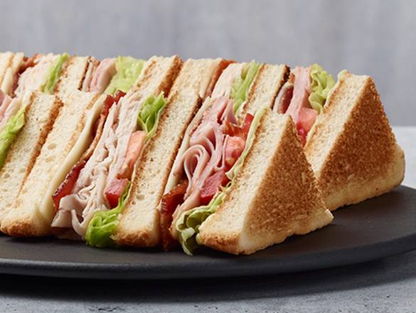 Order Triple Decker Club food online from Paisano's Pizza store, Brentsville on bringmethat.com