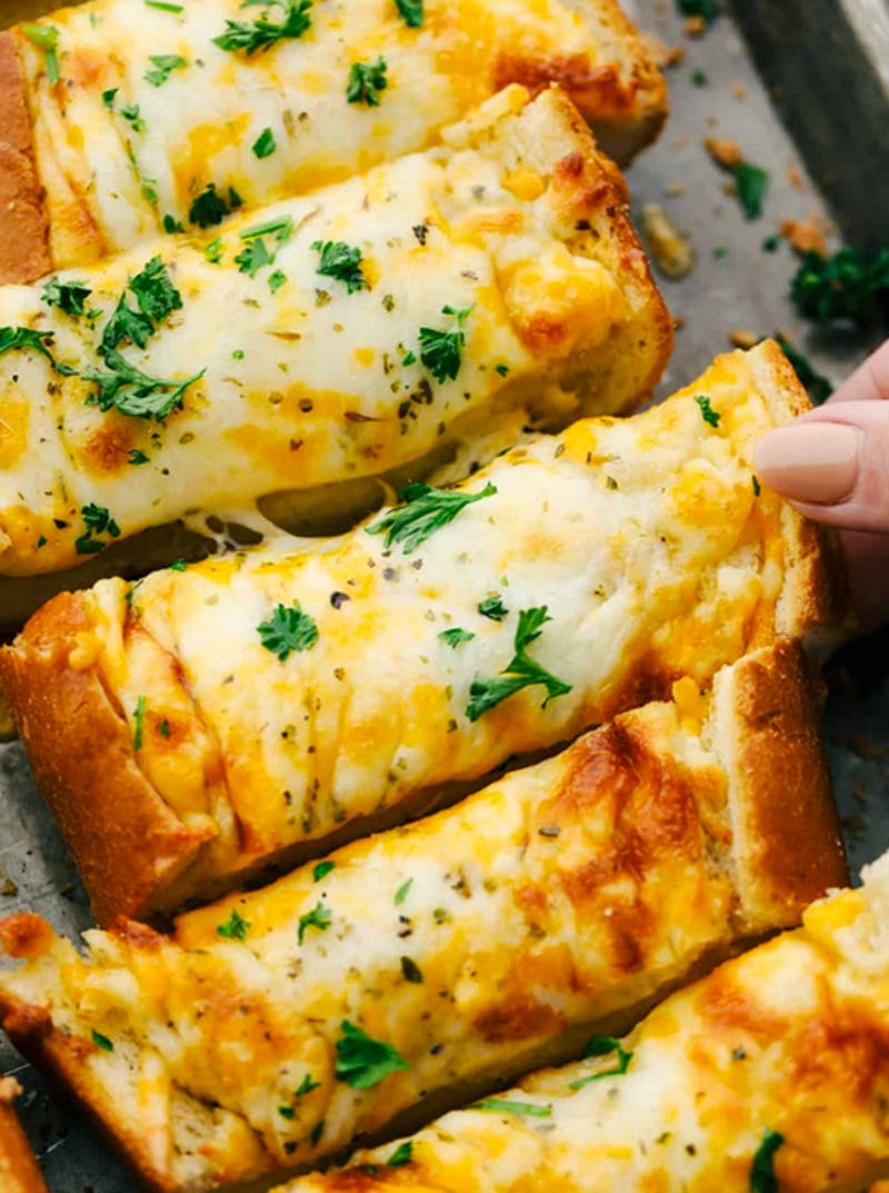 Order Garlic Bread Parmigiana - Appetizer food online from Brother Bruno Pizza store, Washingtonville on bringmethat.com
