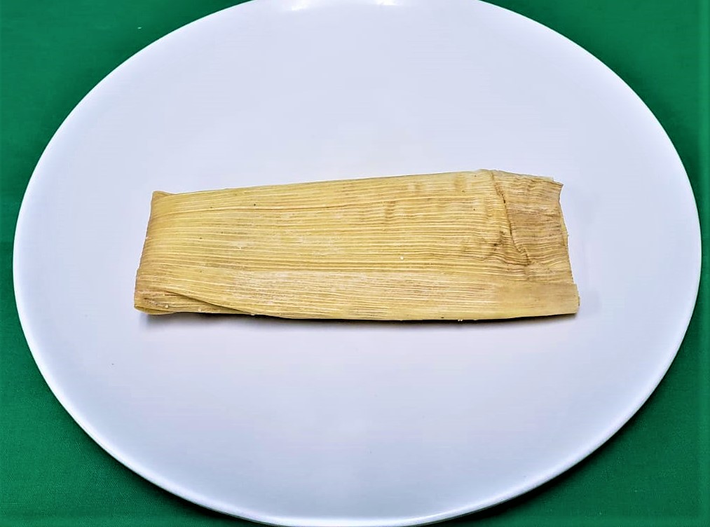 Order Green Chicken Tamal food online from 3 Aguilas Taqueria store, Denton on bringmethat.com