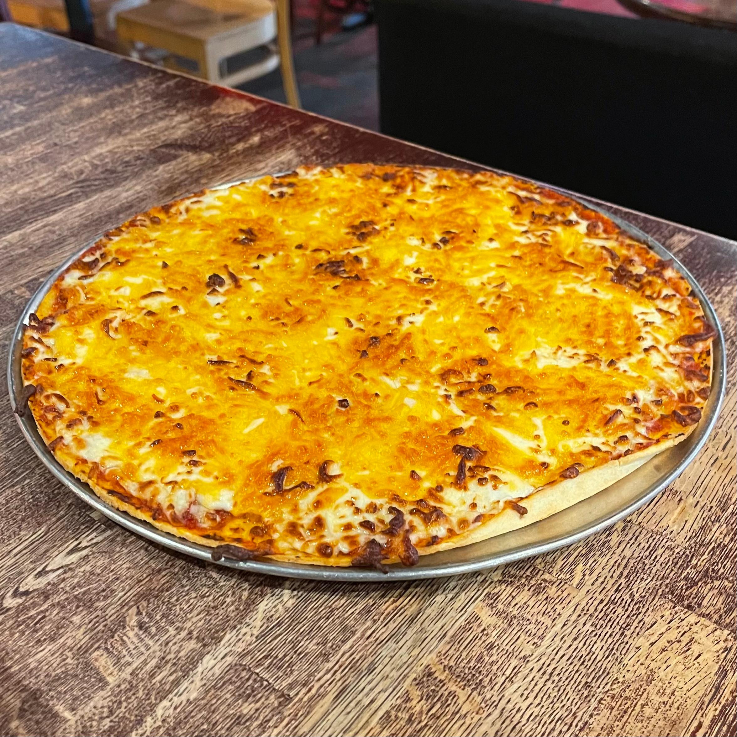 Order Cheese Pizza food online from Kick Butt Café store, Austin on bringmethat.com