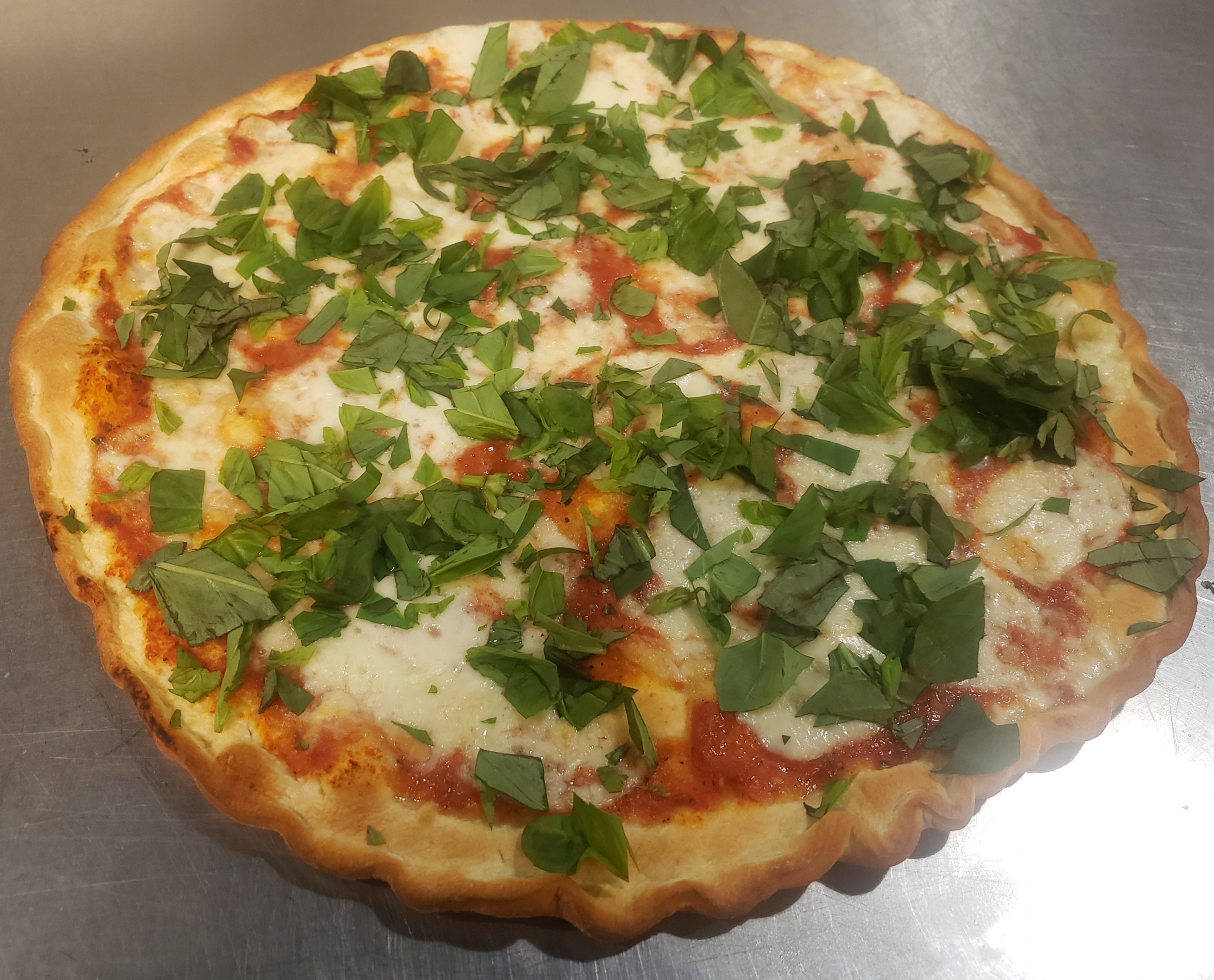 Order Margherita Pizza food online from Village Pizza store, Chicago on bringmethat.com
