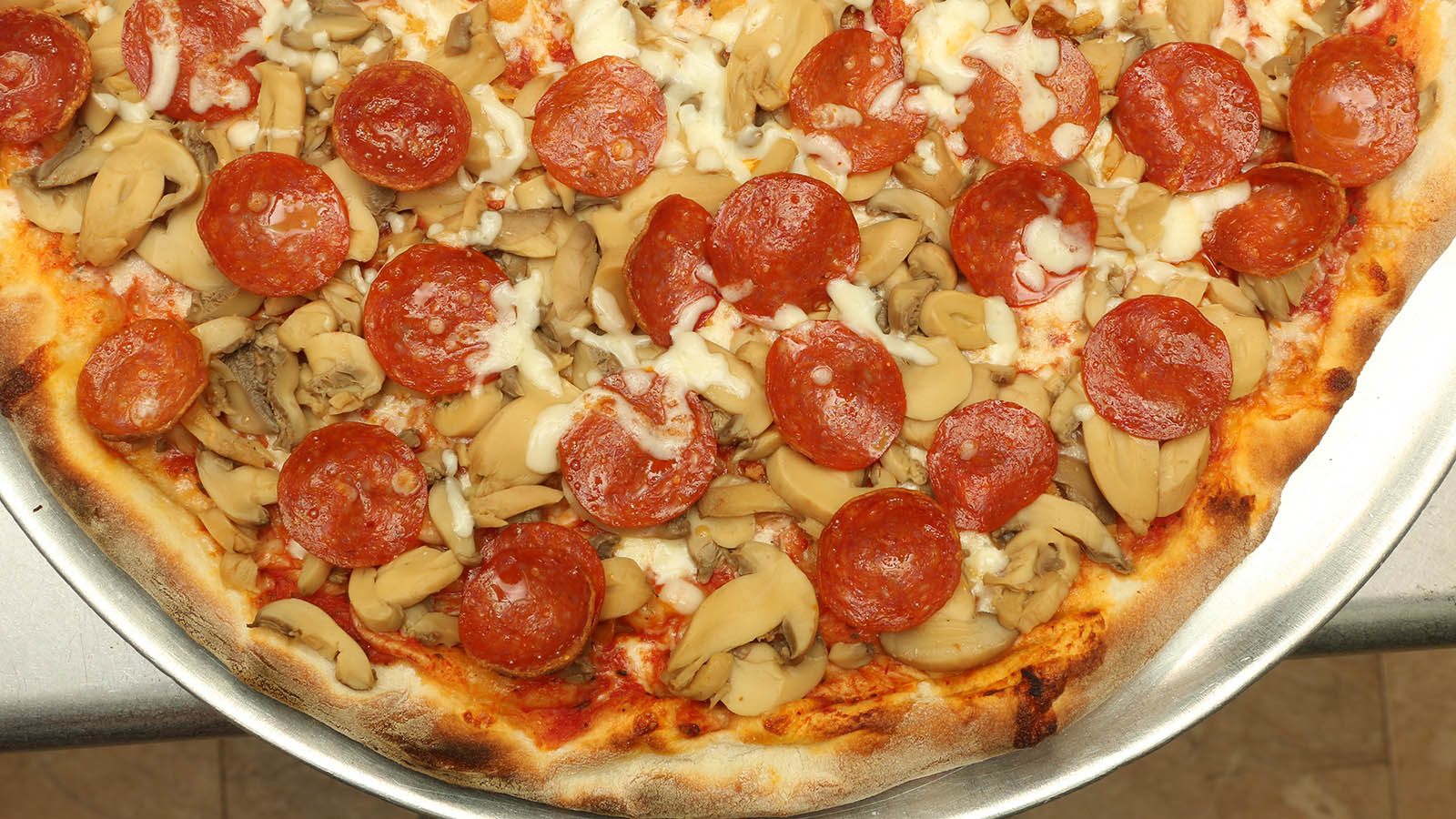 Order Mushroom Pepperoni Slice food online from Joey Pepperoni's Pizza store, Bronx on bringmethat.com