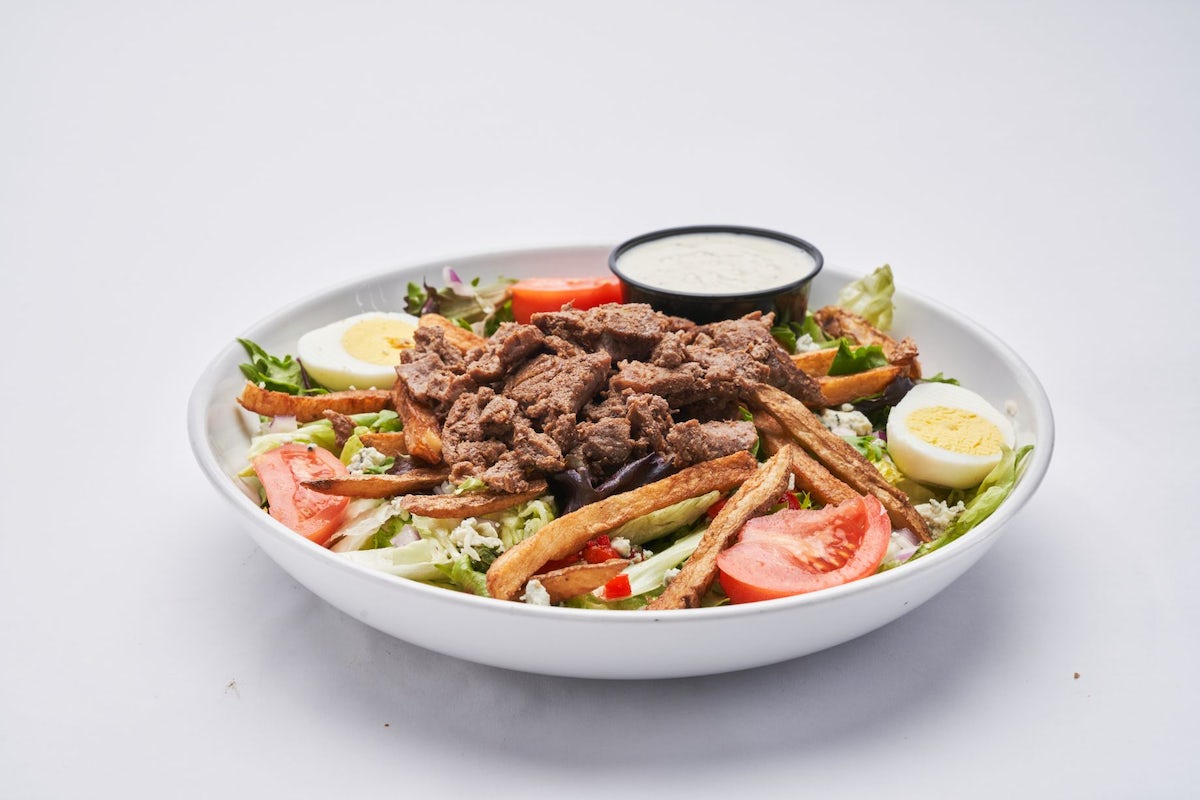 Order Angus Sirloin Steak Salad food online from Primanti Bros. store, Pittsburgh on bringmethat.com