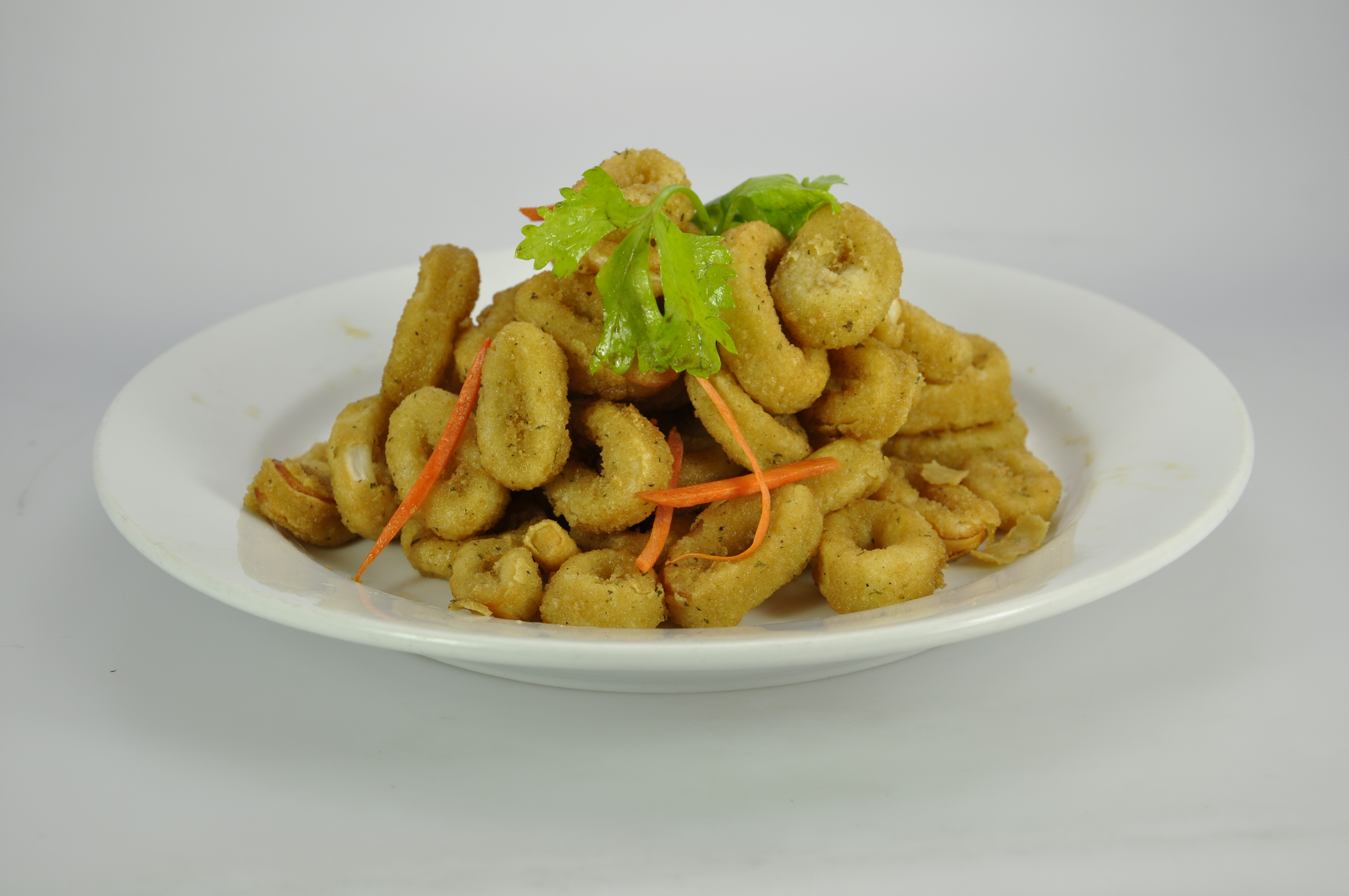 Order Spicy Calamari food online from Kaieteur Express Restaurant store, South Richmond Hill on bringmethat.com