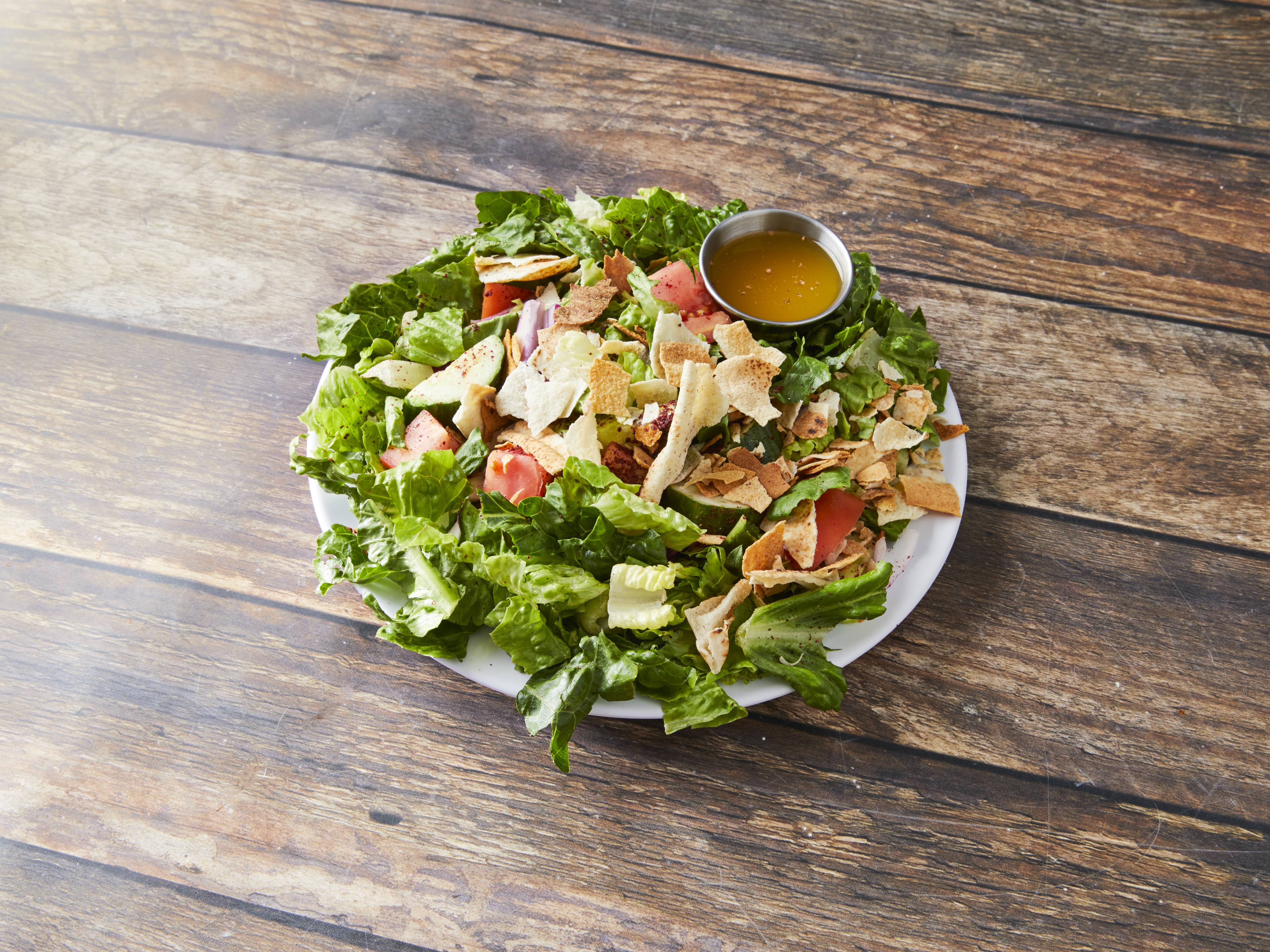 Order Fattoosh Salad food online from K & M Shish Palace store, Auburn Hills on bringmethat.com