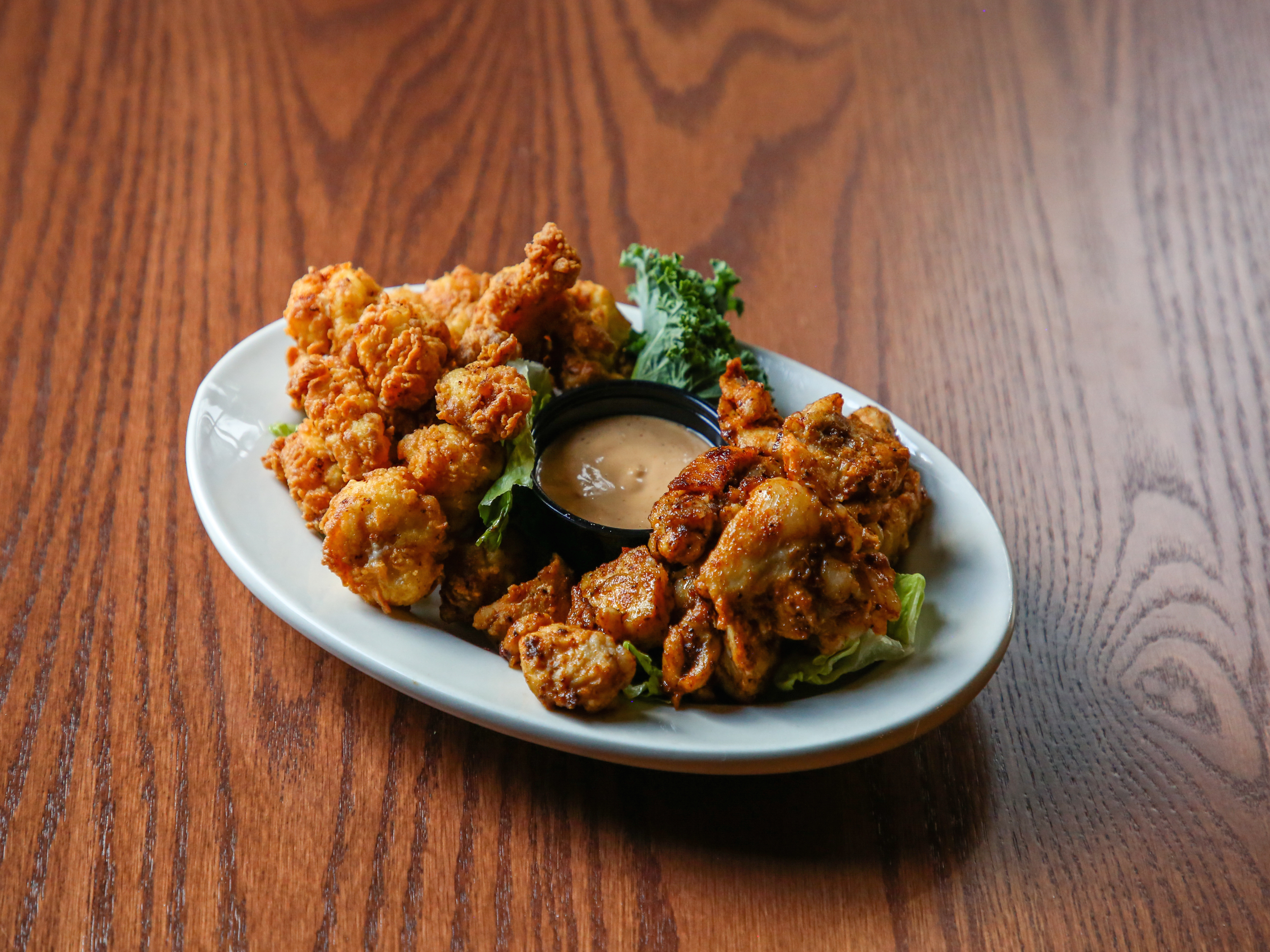 Order Gator Tail Bites food online from Mambo store, New Orleans on bringmethat.com