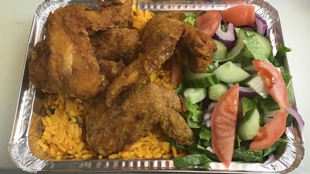 Order 4 Chicken Wings with Rice & Salad - 4 Pieces food online from Super Kennedy Chicken store, Bronx on bringmethat.com
