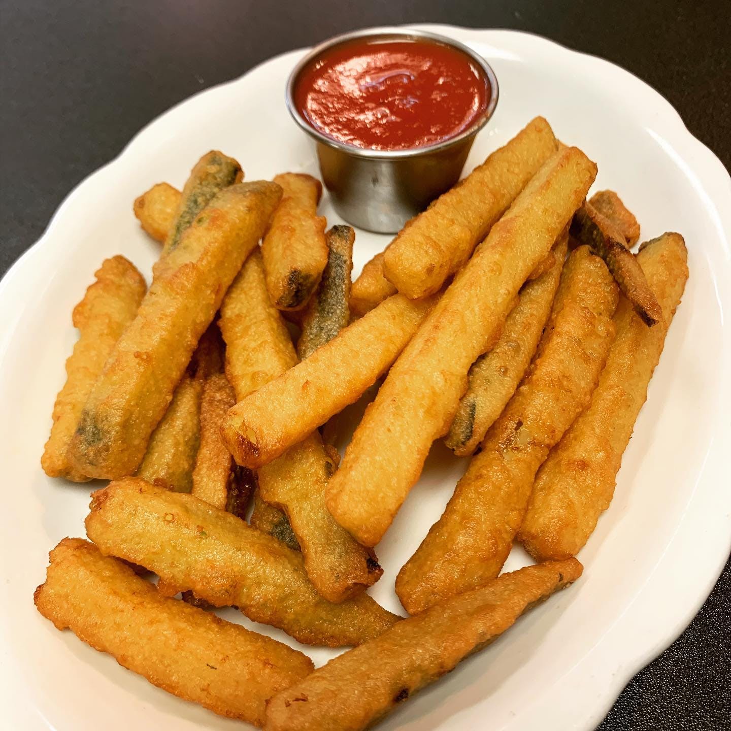 Order Zucchini Sticks - Appetizer food online from Knot Just Pizza store, Hopatcong on bringmethat.com