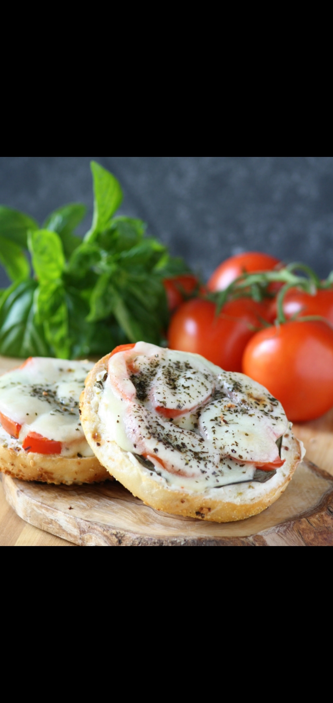 Order Bagel With Melted Fresh Mozzarella And Tomatoes  food online from American Gourmet Foods Deli store, New York on bringmethat.com