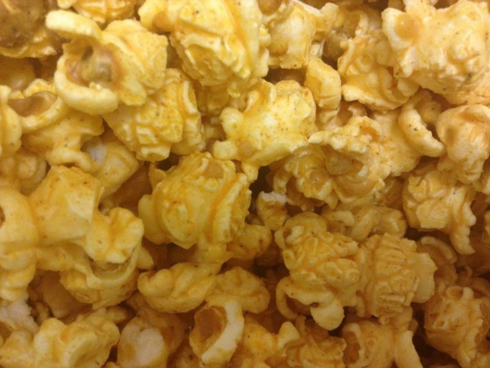 Order LITE CHEESE food online from Poparazzis Popcorn store, Houston on bringmethat.com