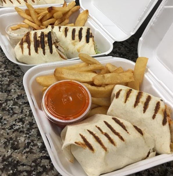 Order Chicken Caesar Wrap - Wrap food online from Frankie G's Pizza store, Toms River on bringmethat.com