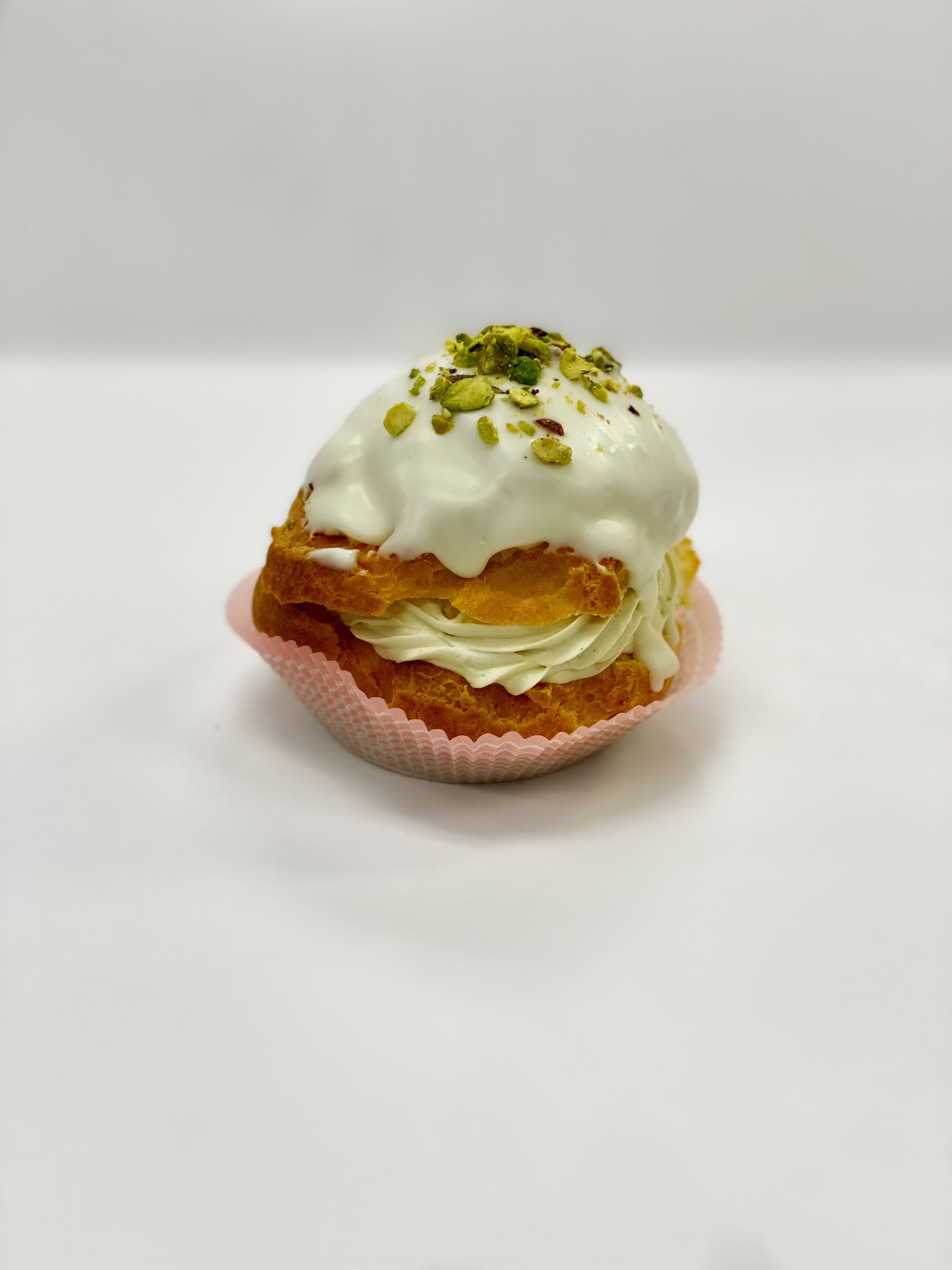 Order Pistachio Cream Puff food online from Cerrato Pastry Shop store, West Springfield on bringmethat.com