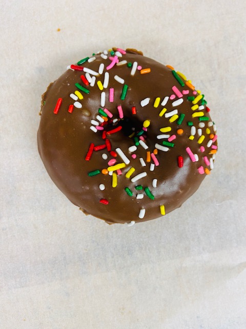 Order Chocolate Sprinkle Cake food online from Highland Donuts store, Bakersfield on bringmethat.com