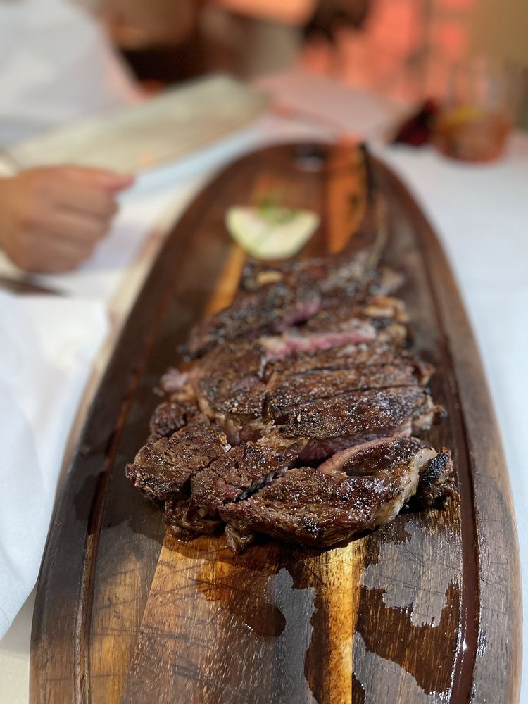 Order Tomahawk (32oz) food online from Greystone The Steakhouse store, San Diego on bringmethat.com