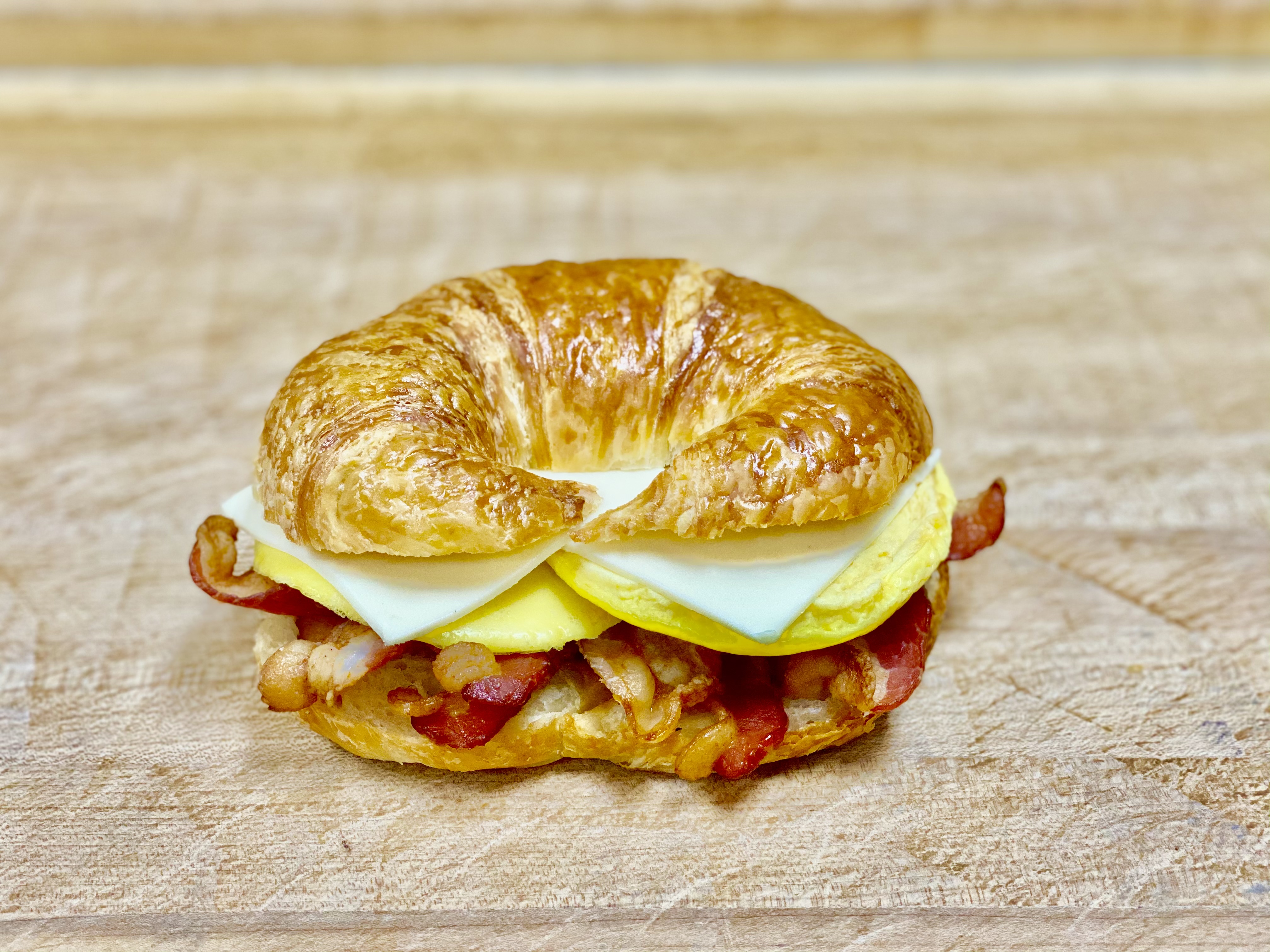 Order B-12 Bacon & Egg & Cheese Croissant food online from K-Inn Donuts store, Paramount on bringmethat.com