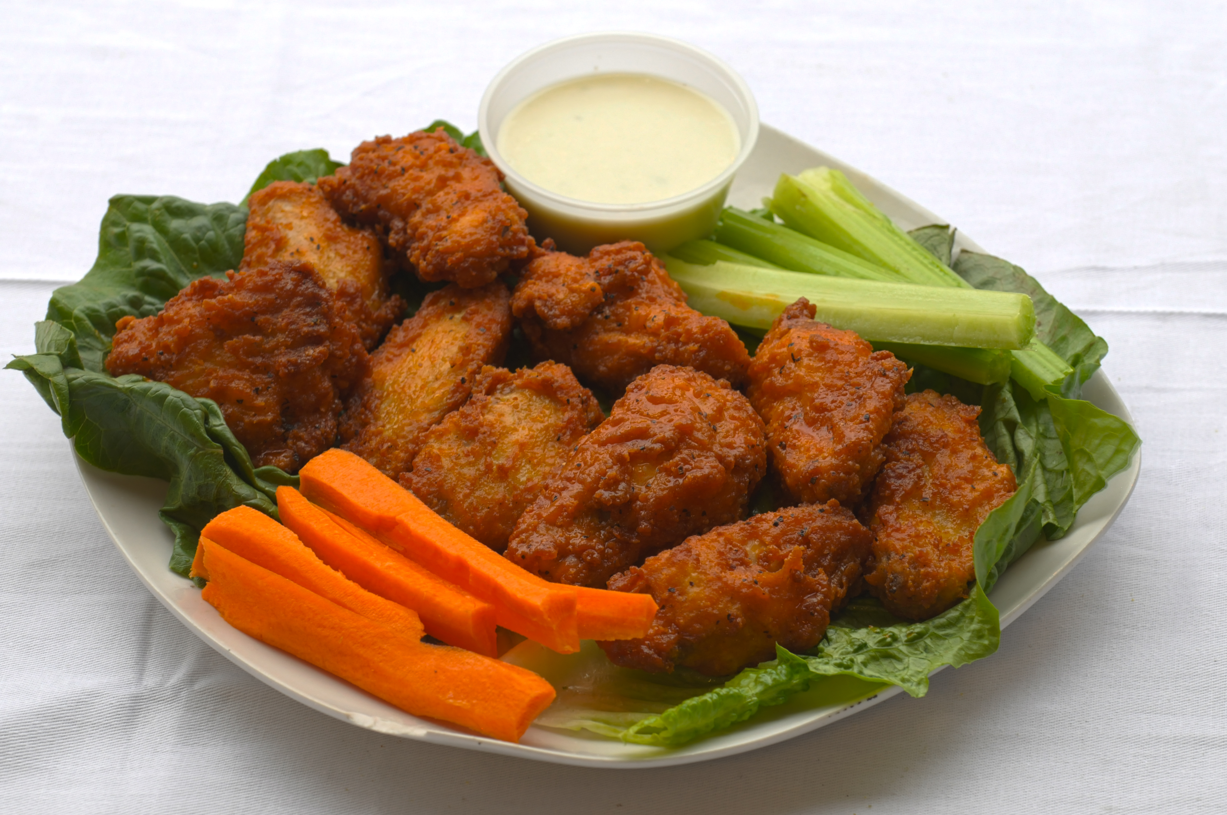 Order Buffalo Wings food online from Roberto's Pizza & Pasta store, New Rochelle on bringmethat.com