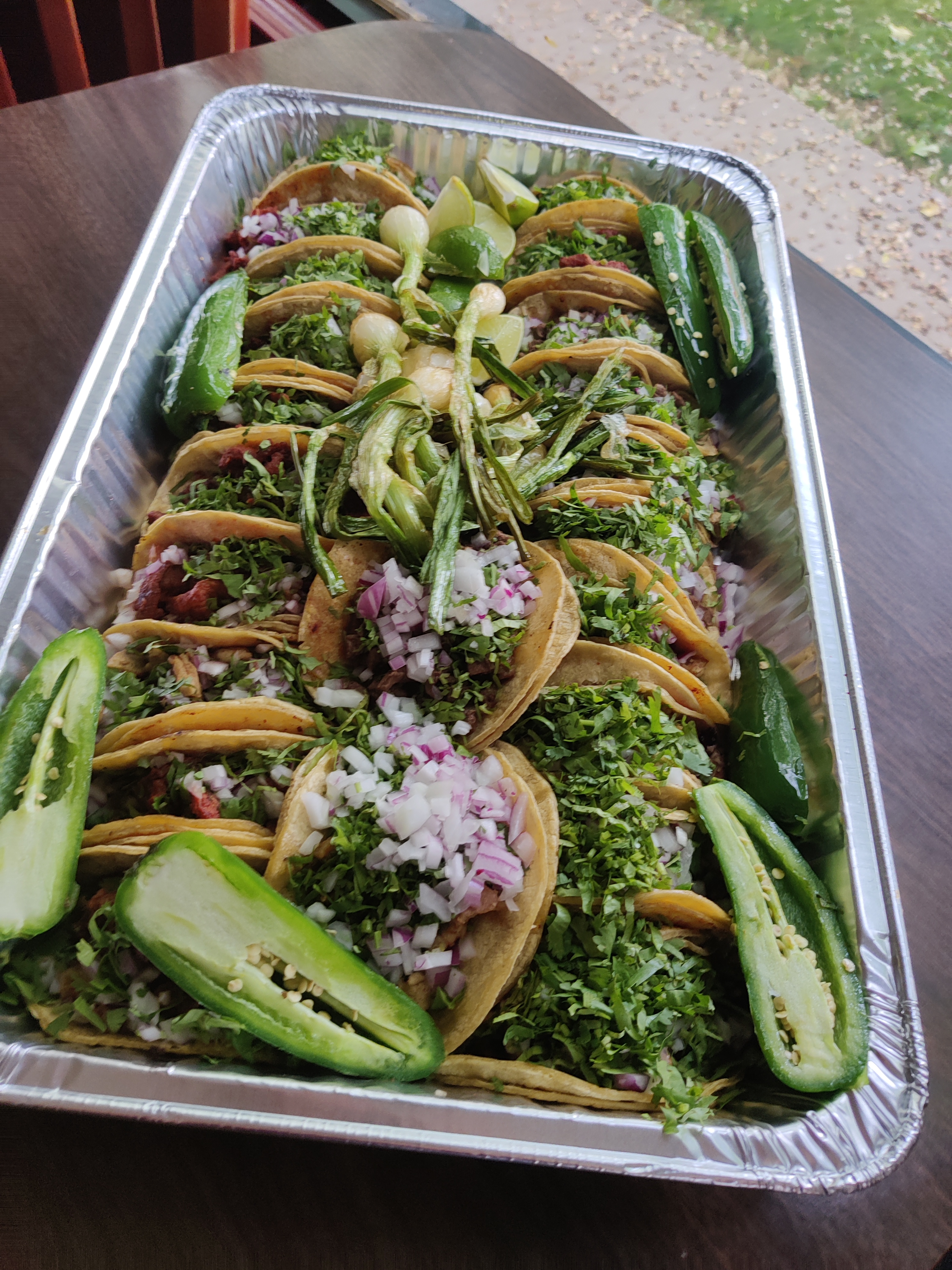 Order 12 Tacos food online from La Catrina Restaurant store, Chicago on bringmethat.com