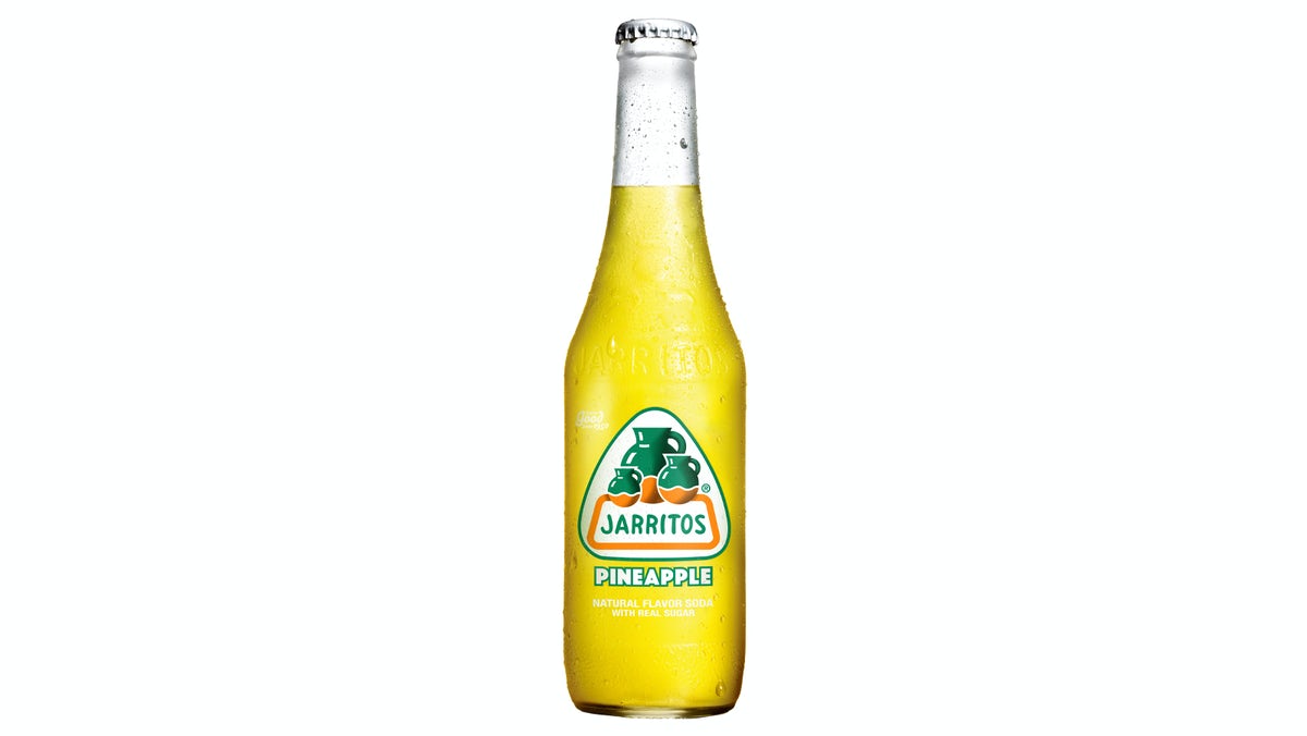 Order Jarritos Bottled Soda – Pineapple food online from Tijuana Flats store, Virginia Beach on bringmethat.com