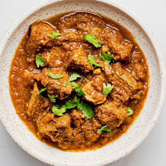 Order Goat Curry food online from Sansar Indian Restaurant store, Tracy on bringmethat.com