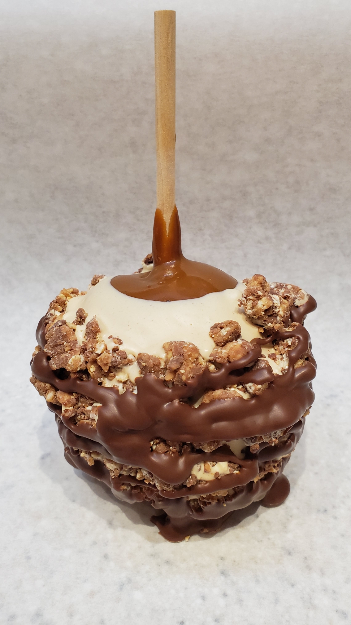 Order Snickers Caramel Apple food online from Rocky Mountain Chocolate Factory store, Tempe on bringmethat.com