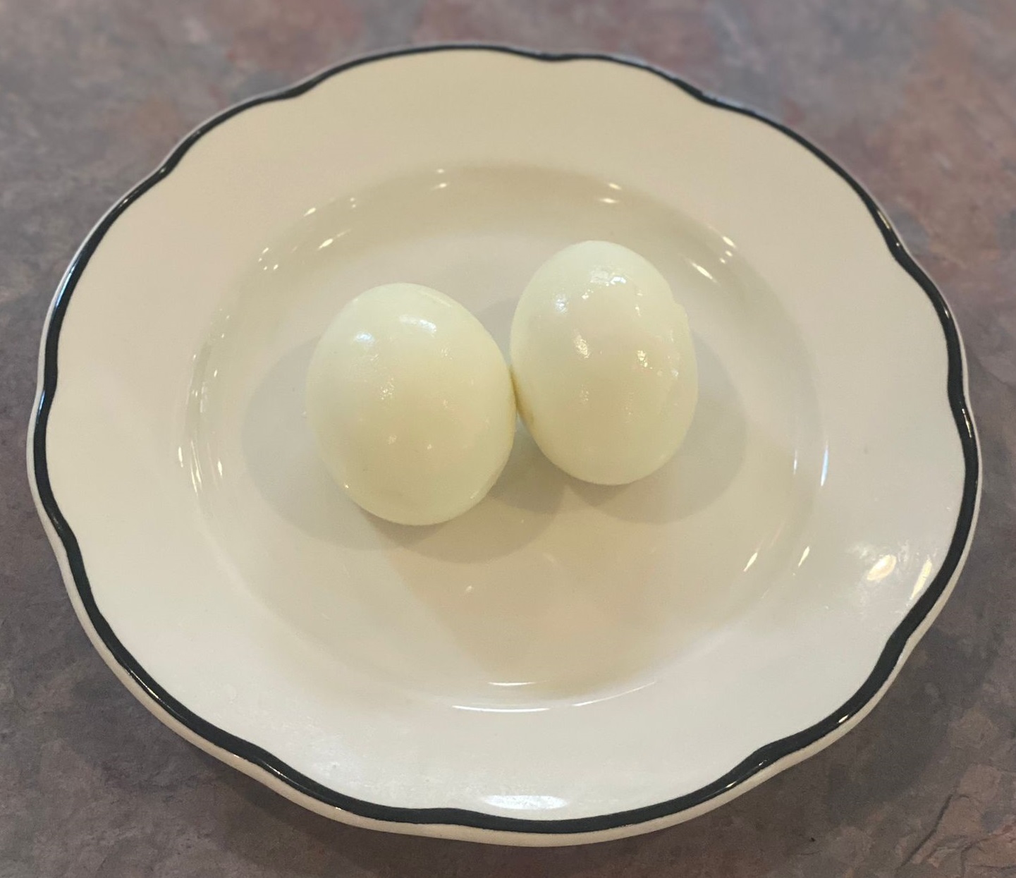 Order 2 Boiled Eggs food online from Oliveiras Peabody store, Peabody on bringmethat.com