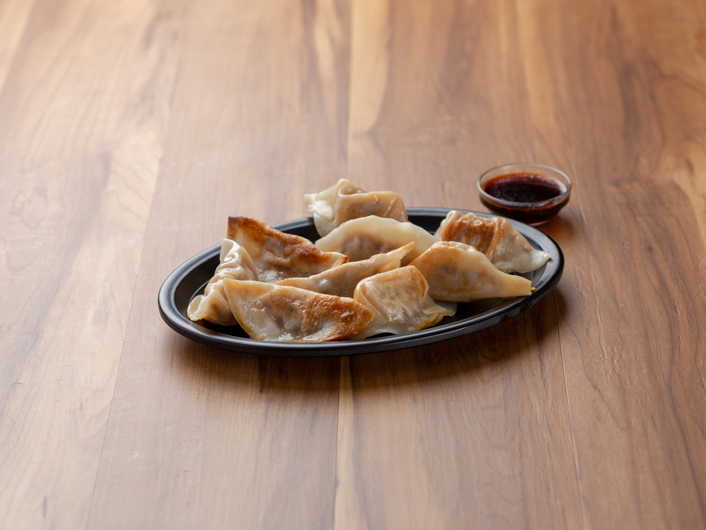Order A10. Fried Pork Dumplings food online from Hot Wok Chinese Restaurant store, Linthicum Heights on bringmethat.com