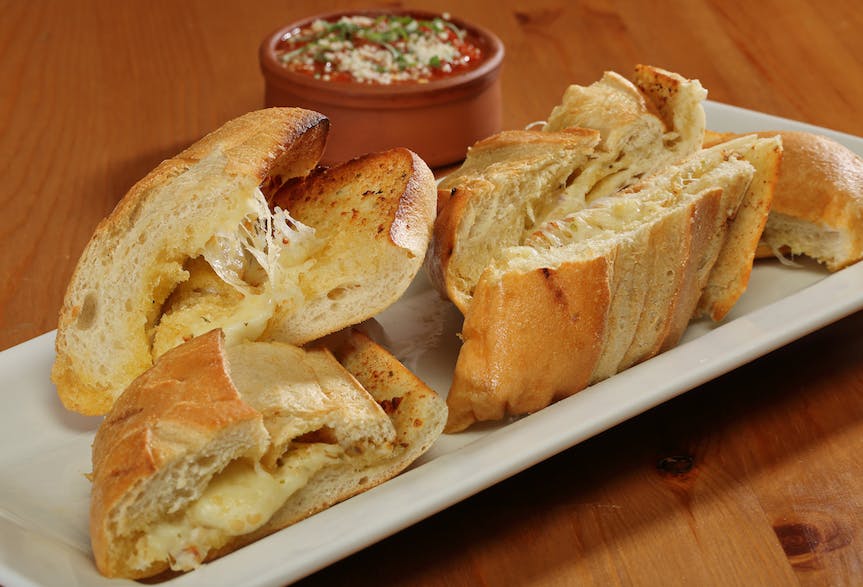 Order Garlic Bread with Cheese - 12'' food online from Tuscan Oven store, Albany on bringmethat.com