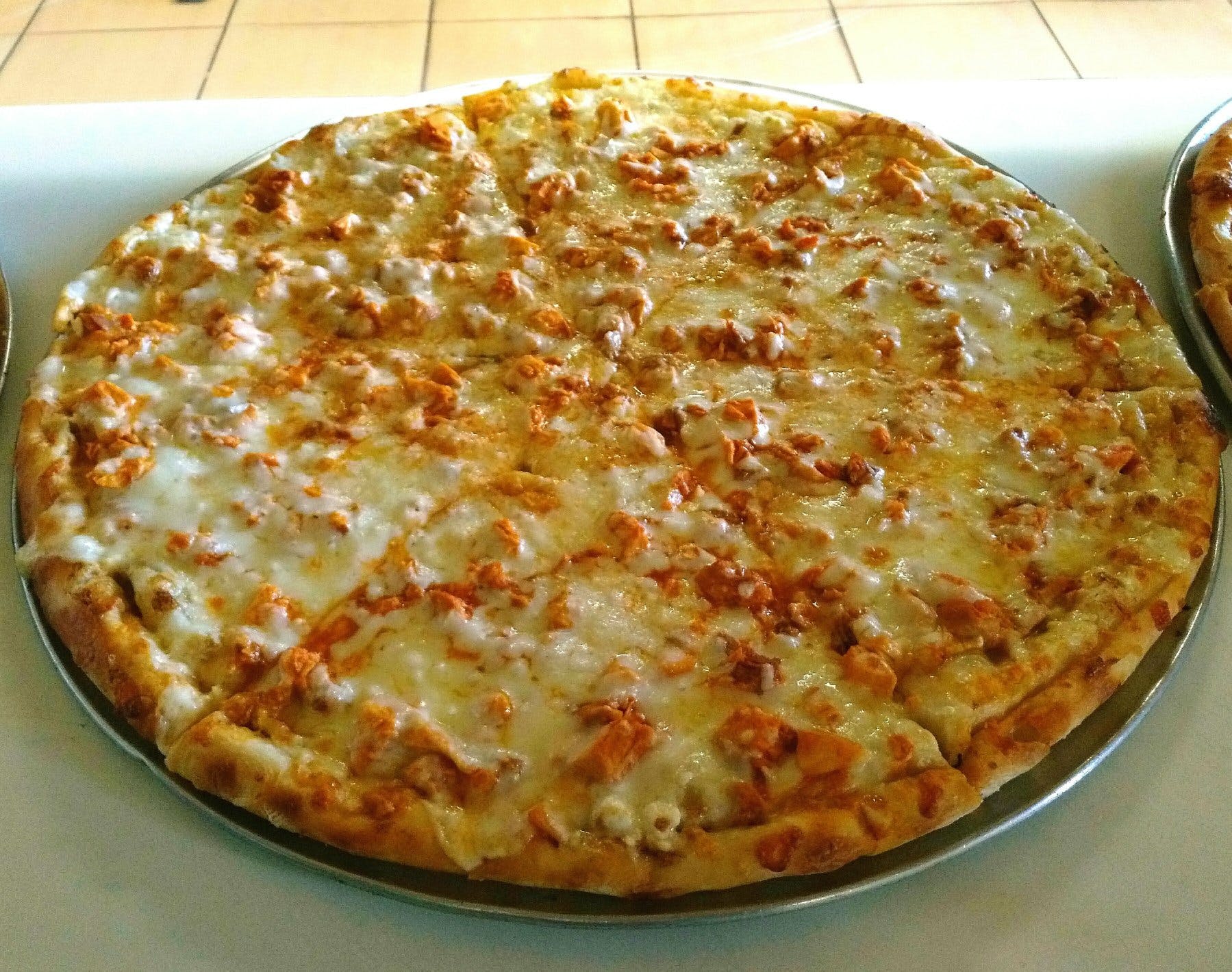 Order Buffalo Chicken Pizza - 14" food online from Pizza Joint store, Pinellas Park on bringmethat.com