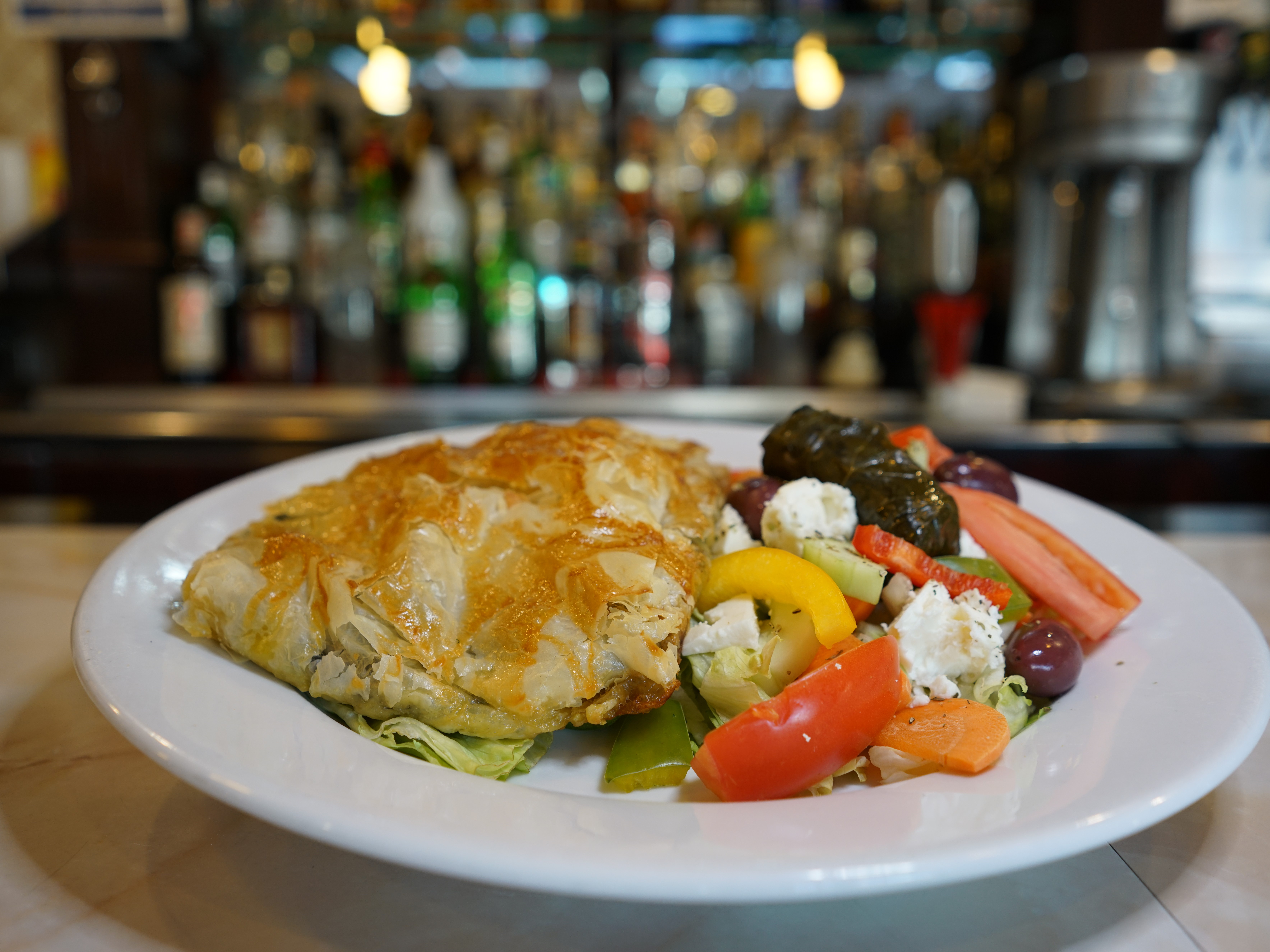 Order Spinach & Feta Cheese Pie with small Greek Salad food online from Fountain Diner store, Hartsdale on bringmethat.com