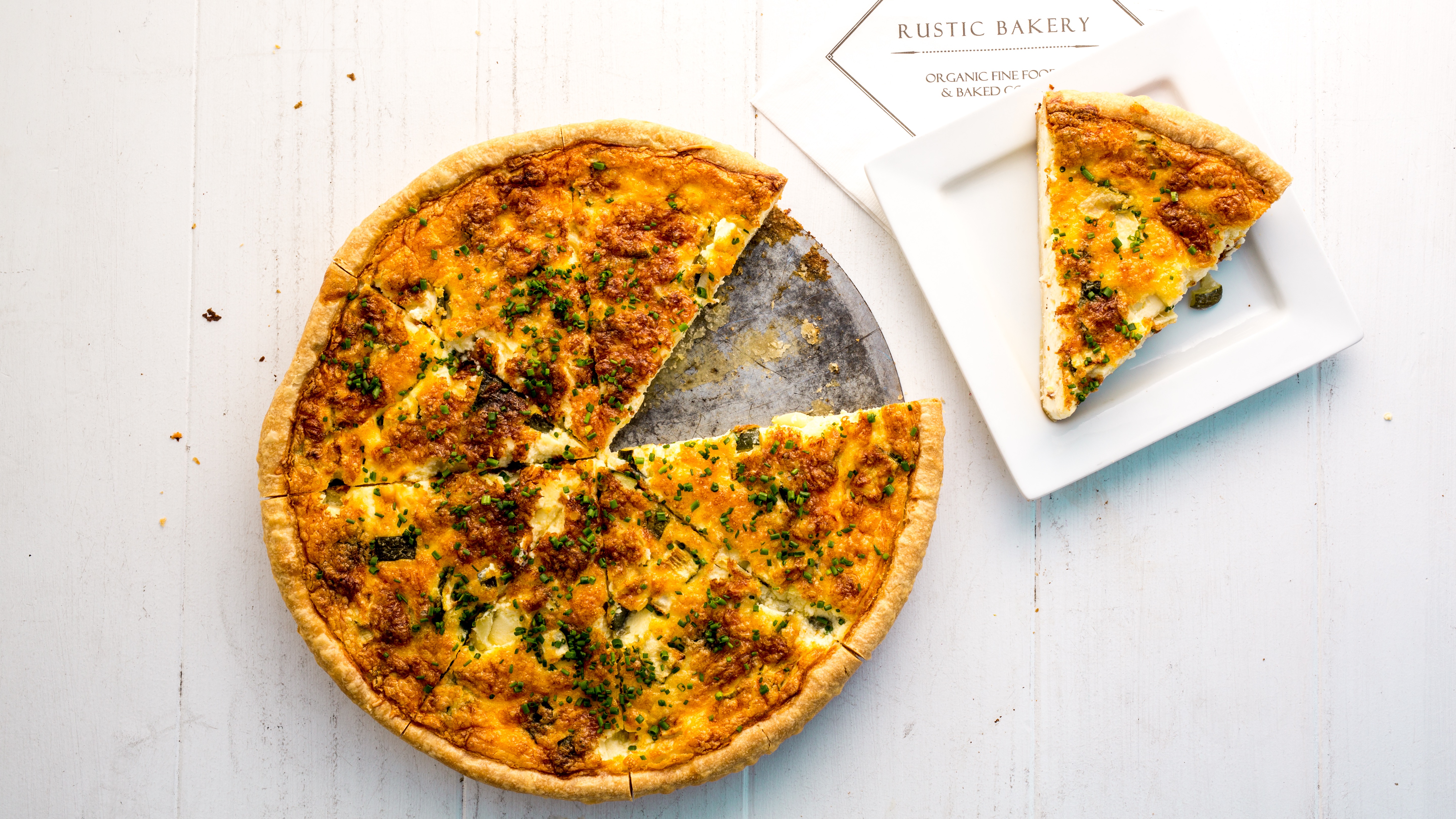 Order Quiche of The Day food online from Rustic Bakery store, Novato on bringmethat.com