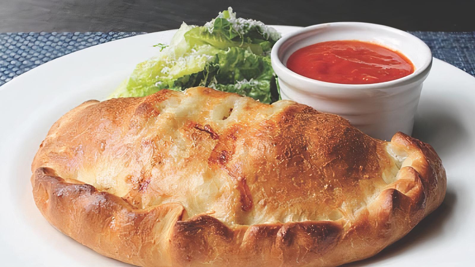 Order Cheese Calzone food online from Umberto's Pizzeria store, New Hyde Park on bringmethat.com