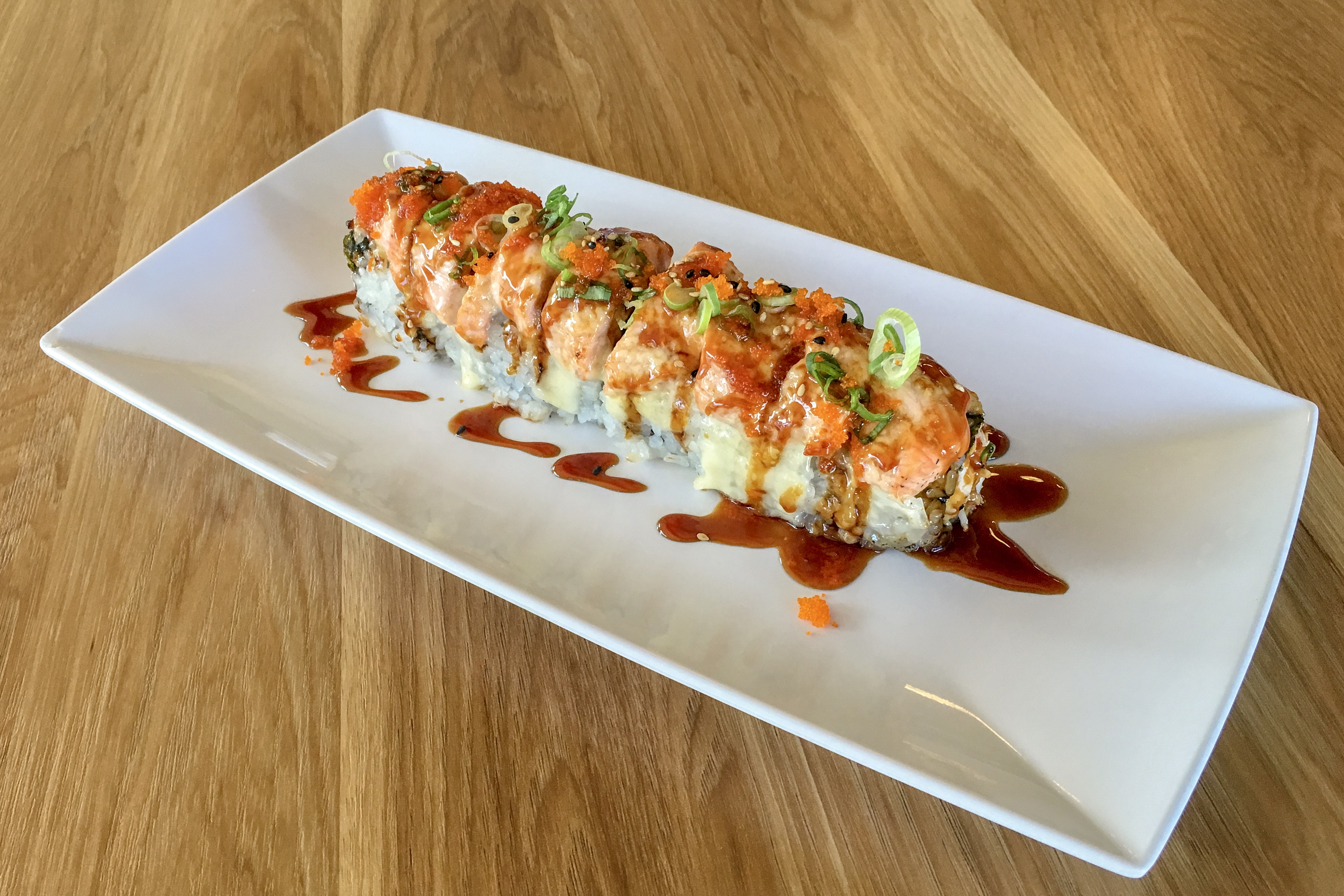 Order Baked Salmon Roll food online from Rollstop Sushi store, San Pedro on bringmethat.com