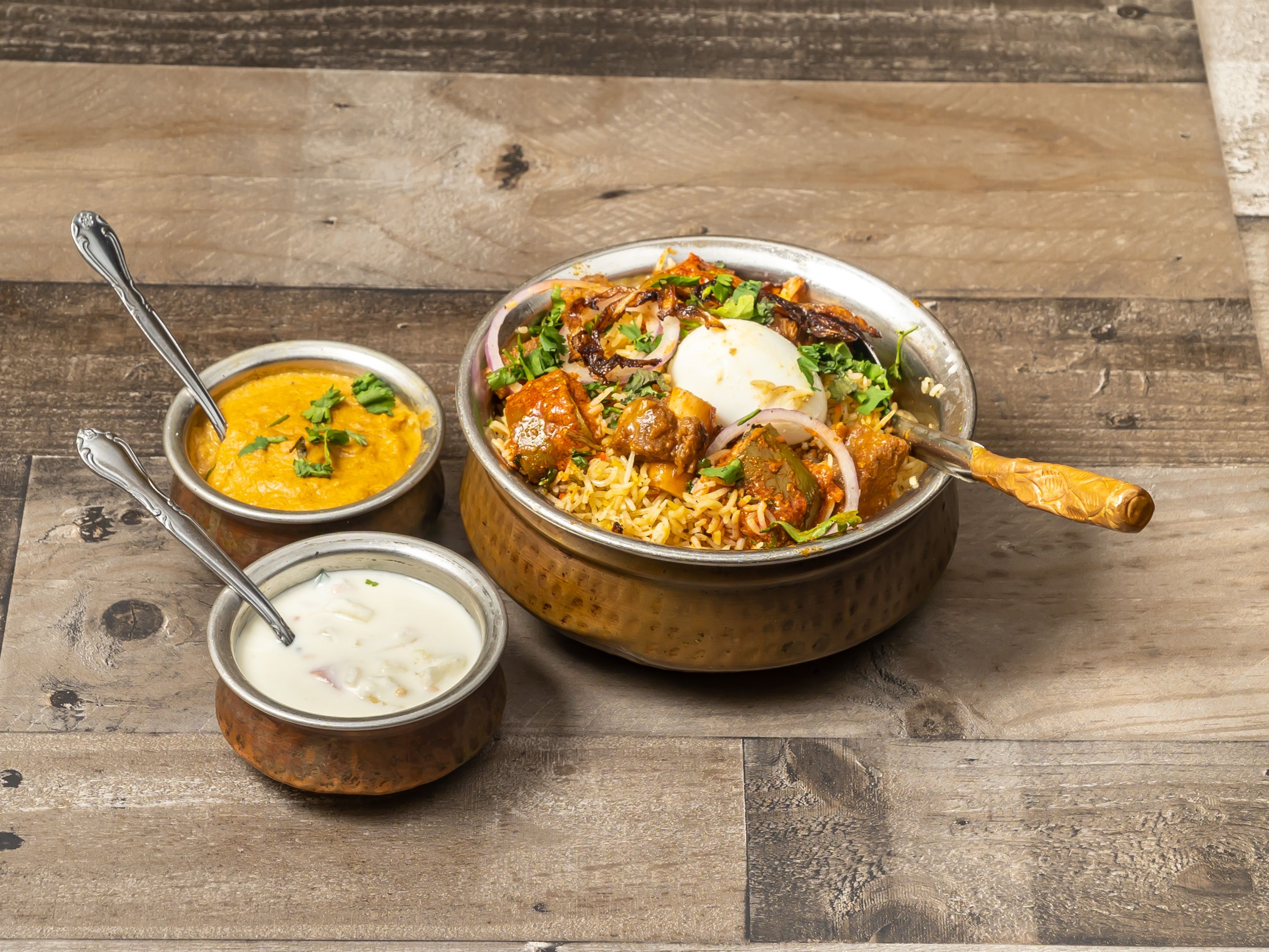 Order Avakaya Goat Biriyani food online from Masala Indian Kitchen store, Dallas on bringmethat.com