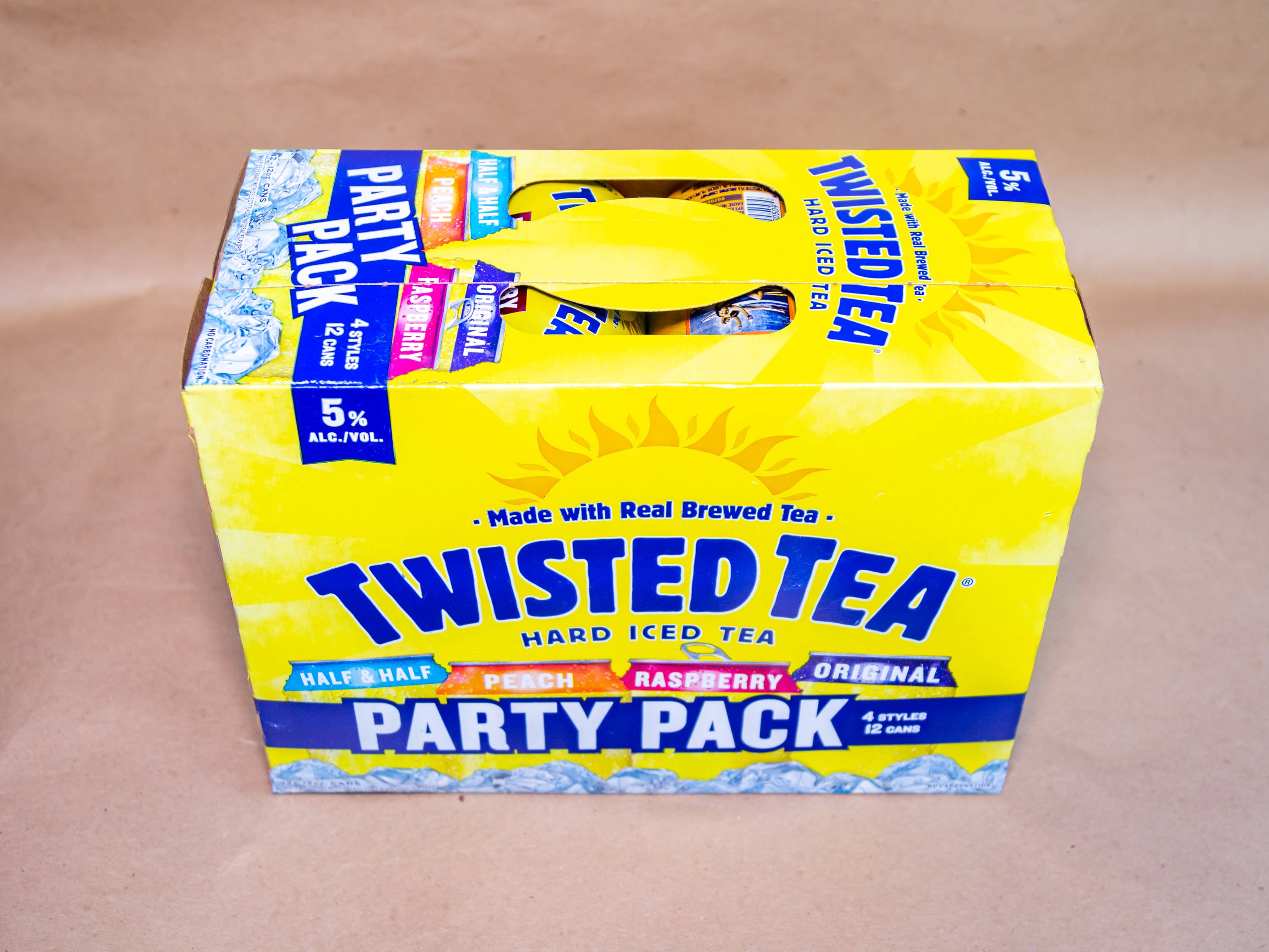 Order 12 Pack Canned Twisted Tea Party Pack Variety  food online from Blue Moon Beer And Smoke Shop store, Holbrook on bringmethat.com