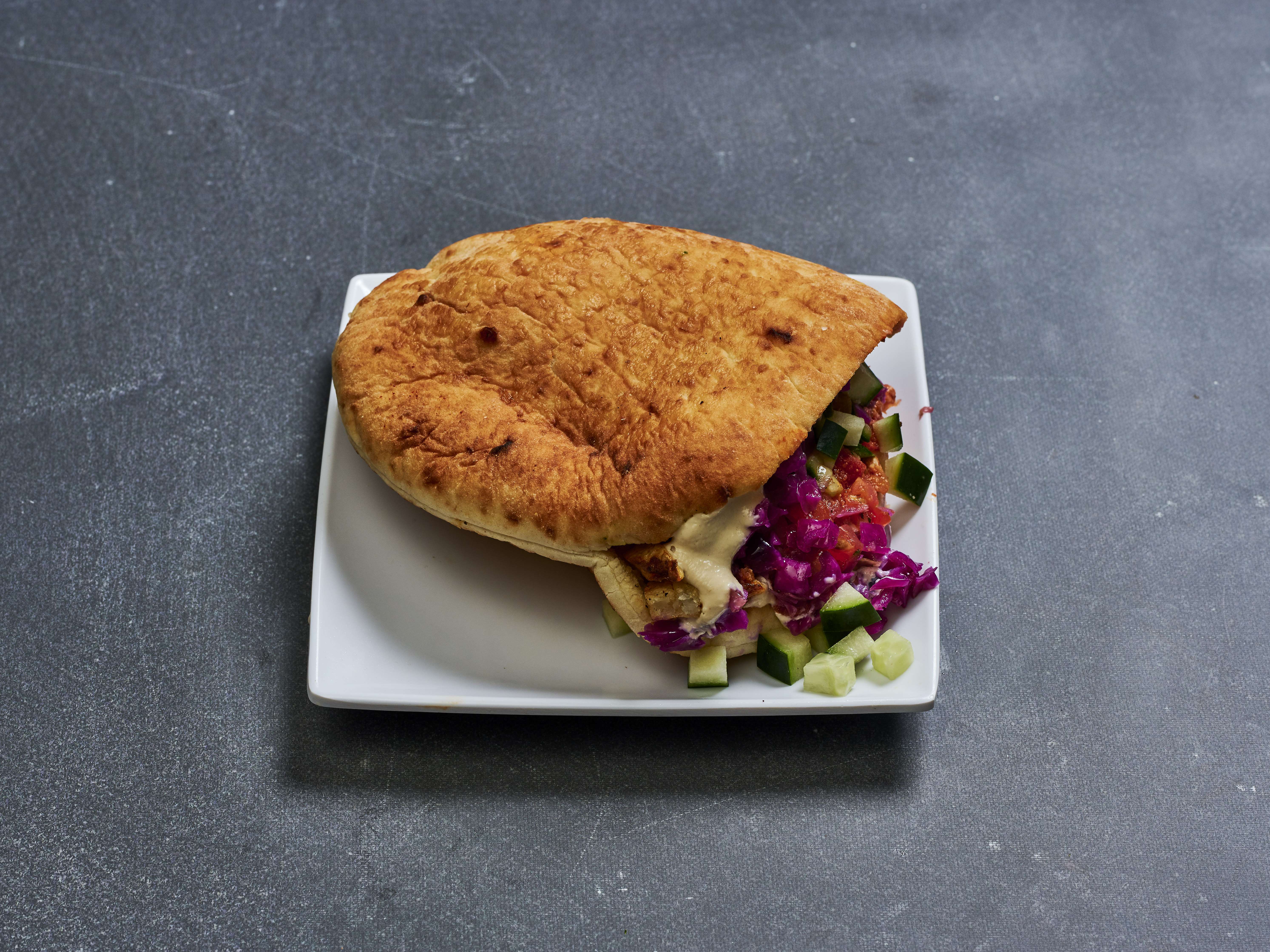 Order Shakshuka Moroccan Sandwich food online from Eggs & Plants store, Seattle on bringmethat.com