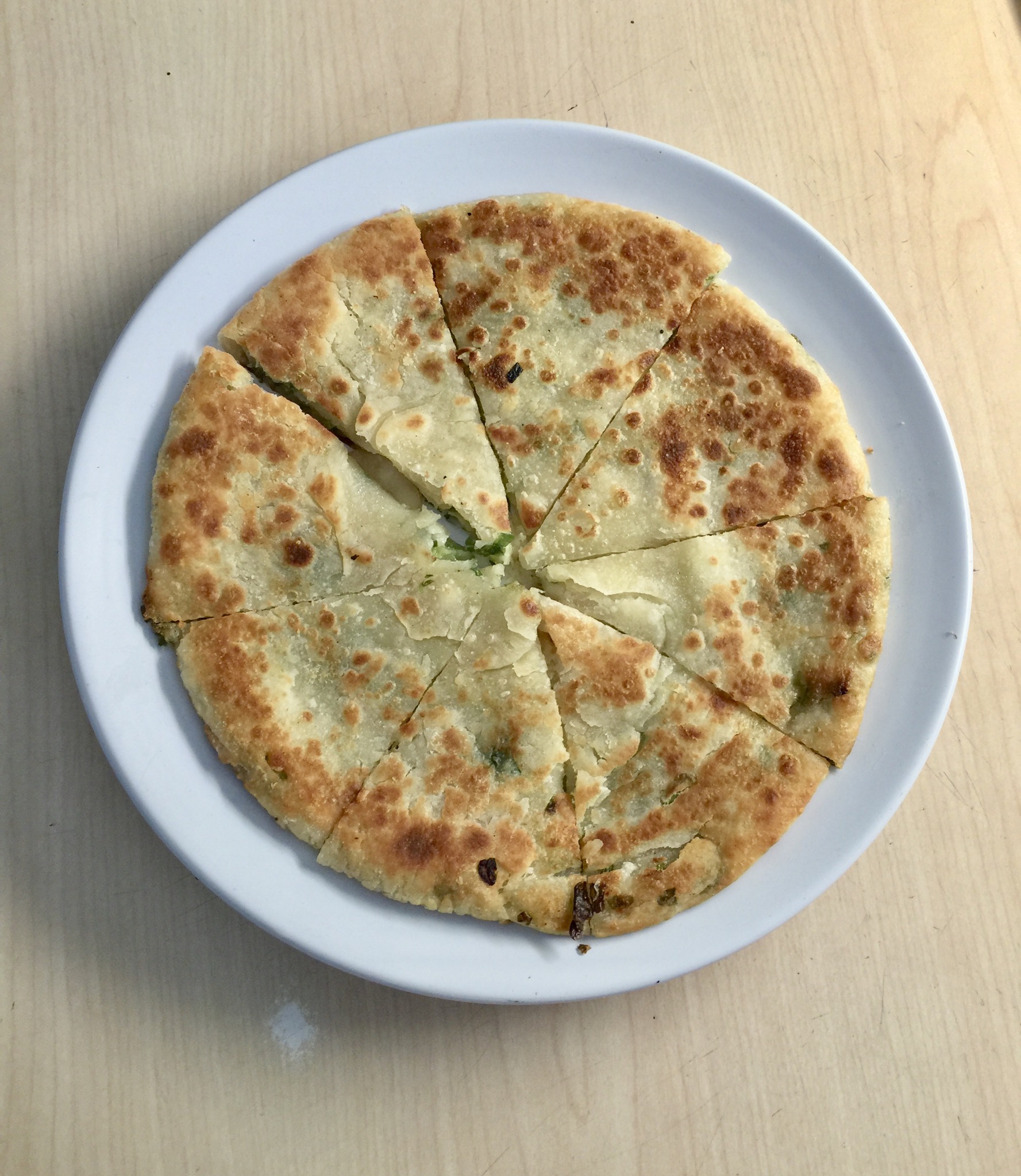 Order 35. Green Onion Pancake food online from M's Kitchen store, Artesia on bringmethat.com