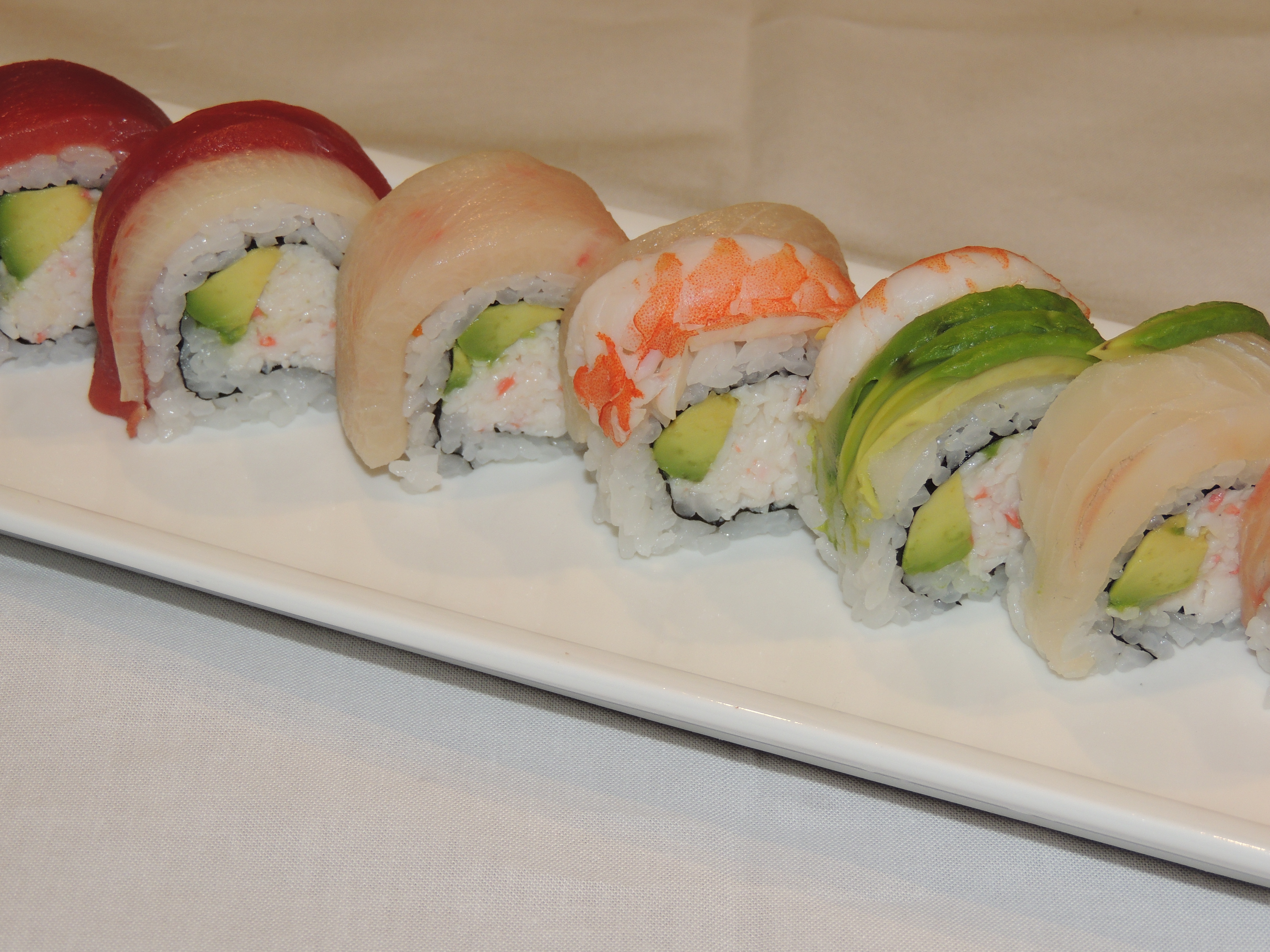 Order Rainbow Roll food online from Minami Sushi store, San Leandro on bringmethat.com