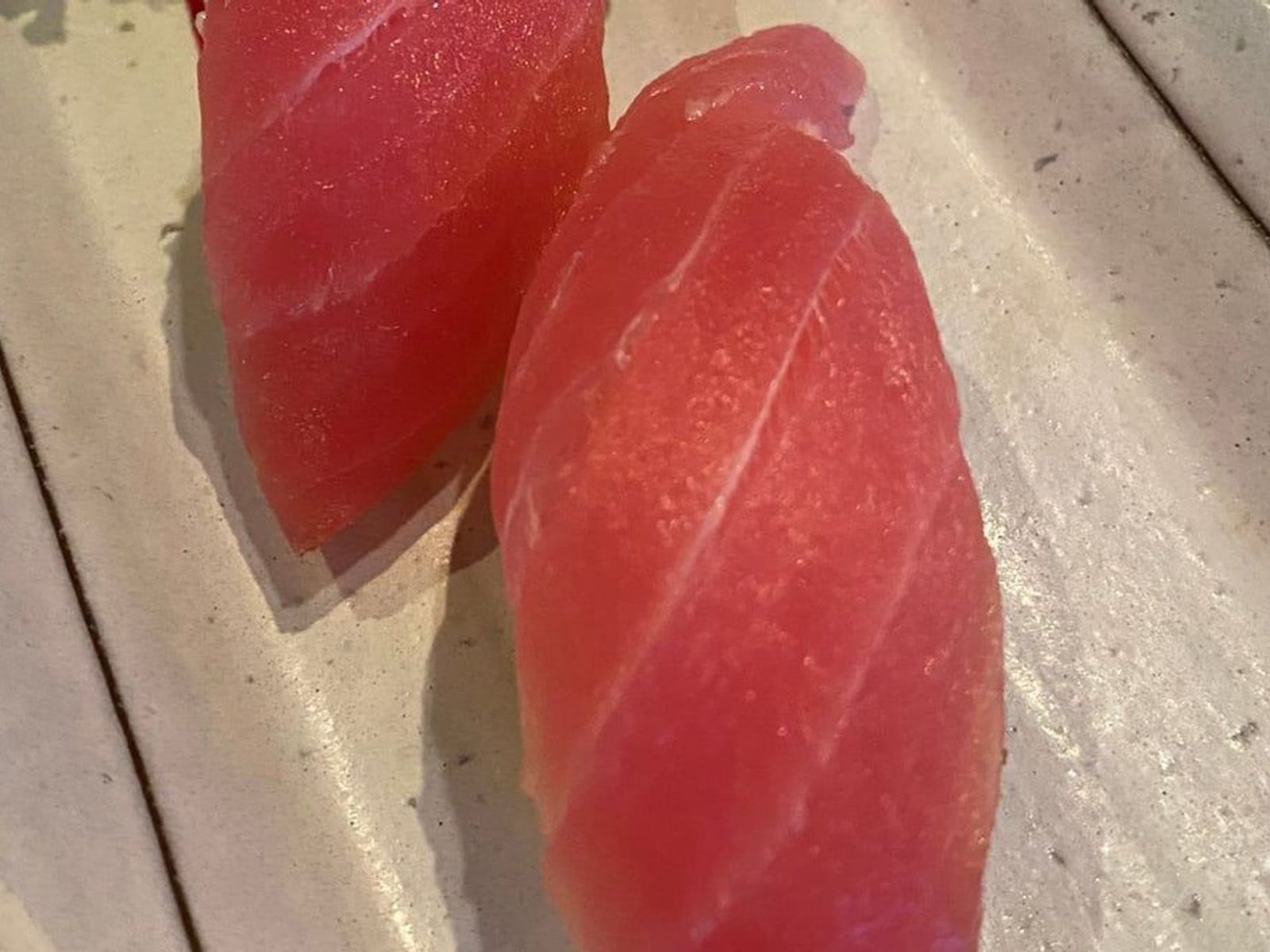 Order Maguro Nigiri food online from Sushi Aoi store, Washington on bringmethat.com