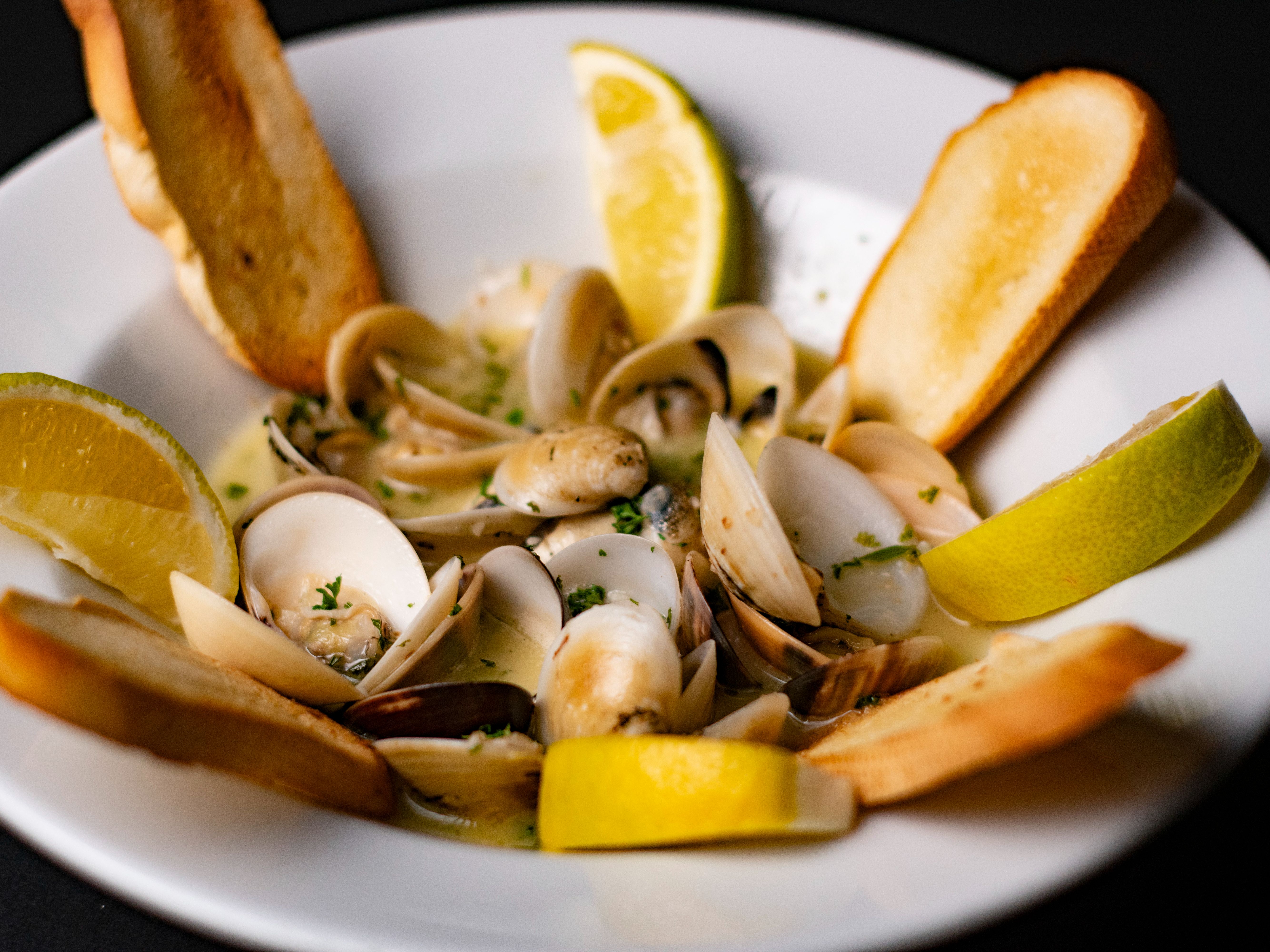 Order Steamed Clams food online from La Papillon store, Lancaster on bringmethat.com