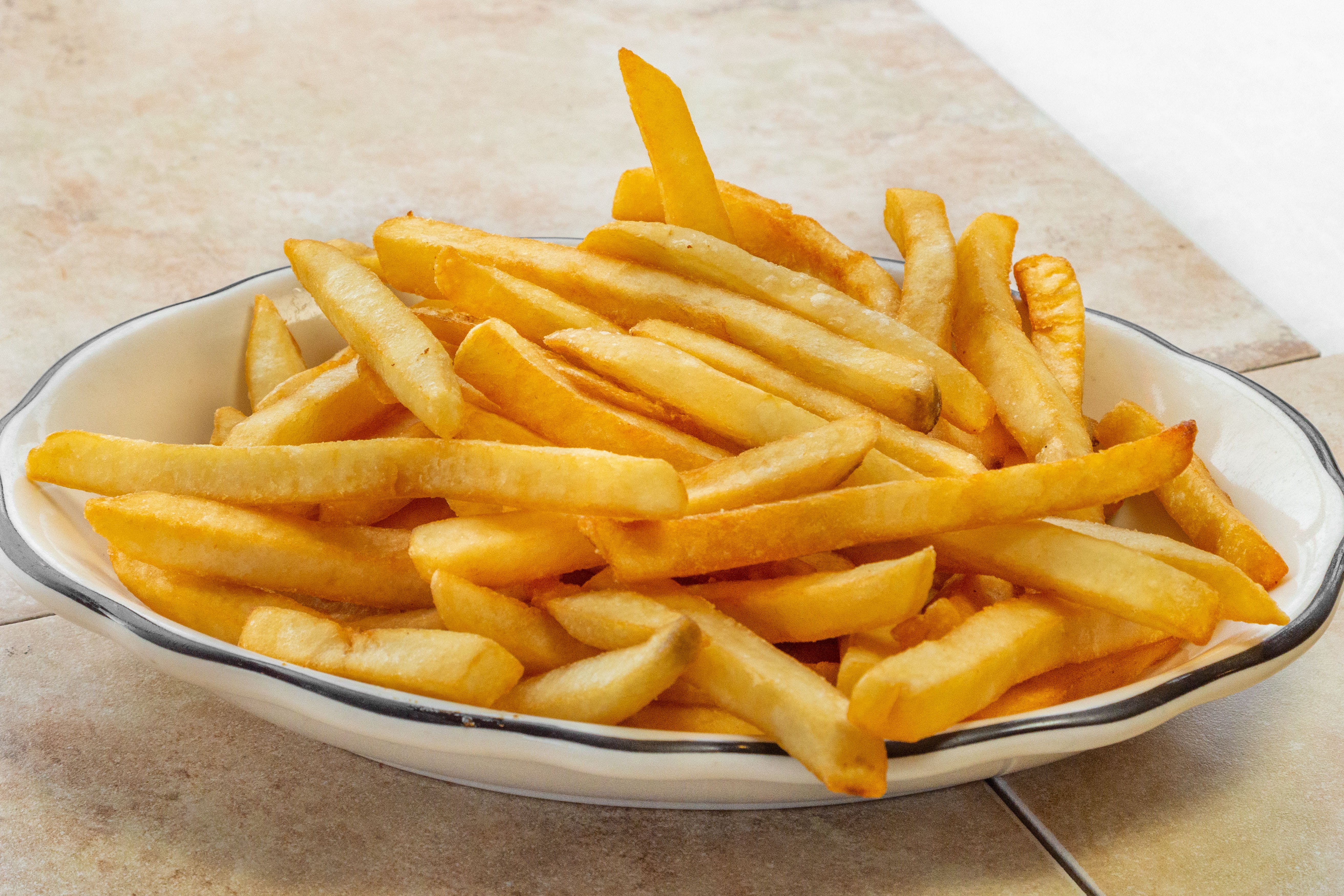 Order French Fries - Appetizer food online from Brunos Pizza store, Gibsonia on bringmethat.com