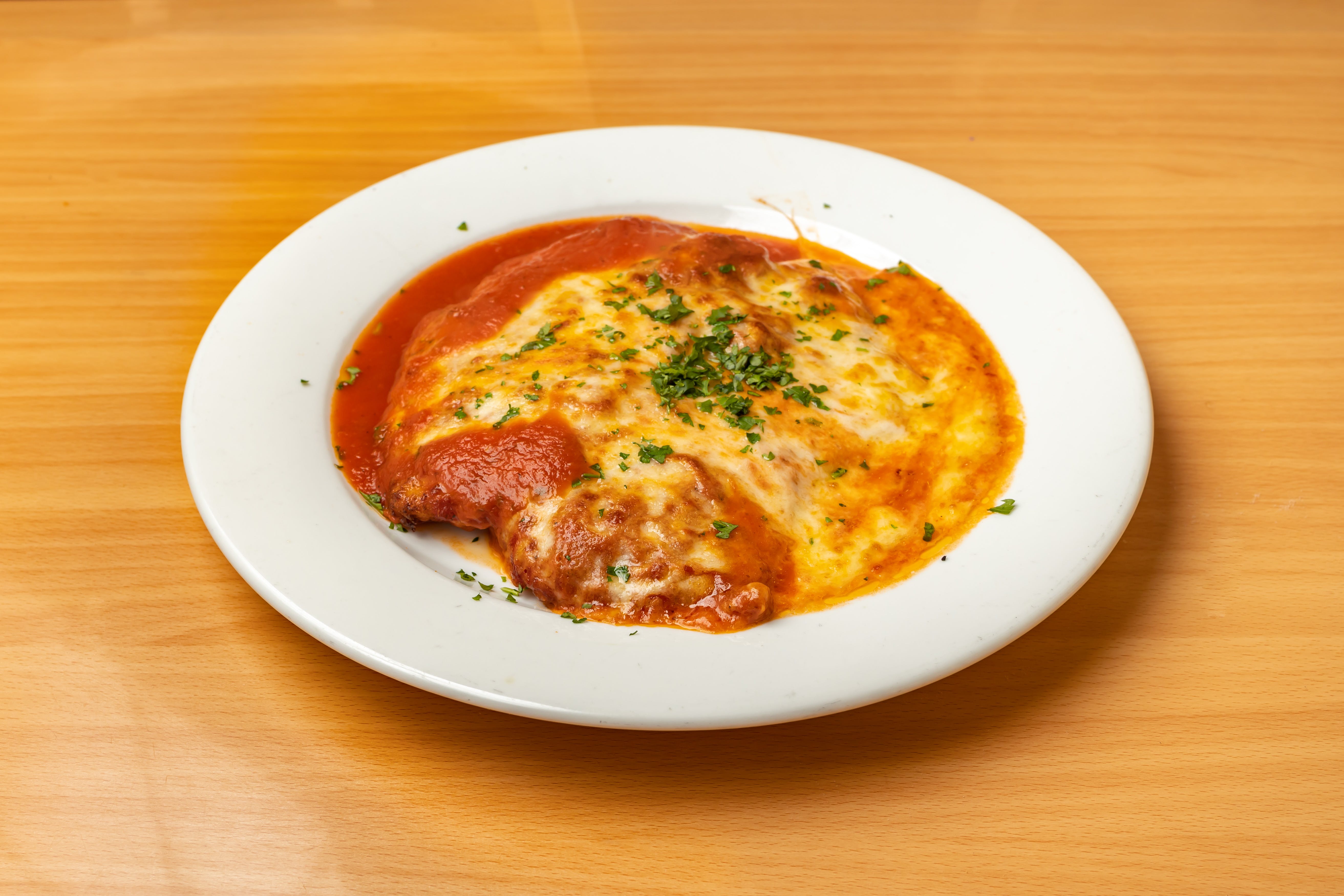Order Chicken Parmigiana - Entree food online from Valentino's store, Fresh Meadows on bringmethat.com