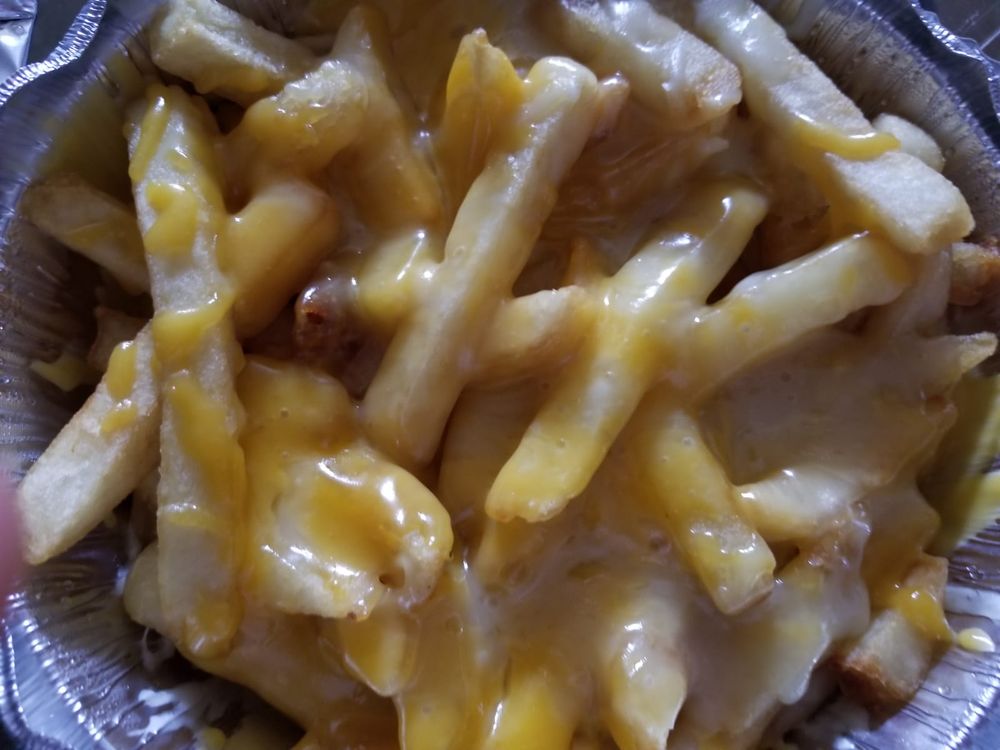 Order Cheese Fries food online from El rey latino store, Forest Hills on bringmethat.com