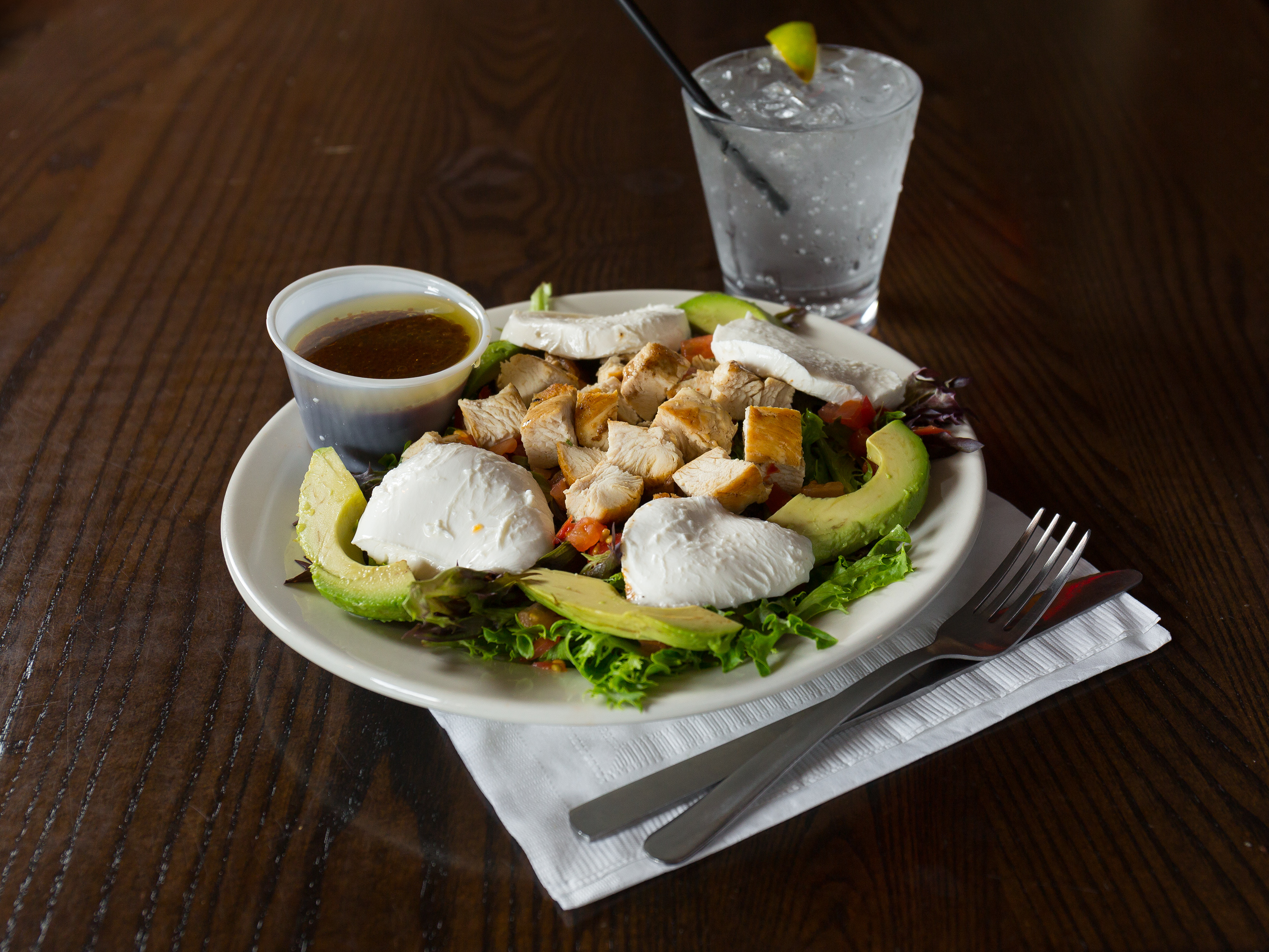 Order Chicken Avocado Caprese Salad food online from Whiskey River - Ames store, Ames on bringmethat.com