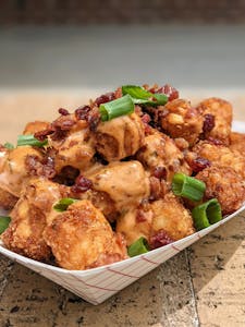 Order Tater Tots food online from Dusty Biscuit Beignets store, Fort Worth on bringmethat.com