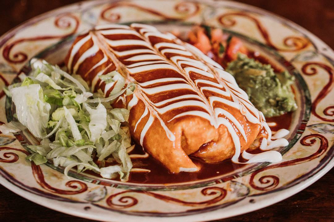 Order Burrito Famoso food online from Acapulco Restaurant store, Alameda on bringmethat.com