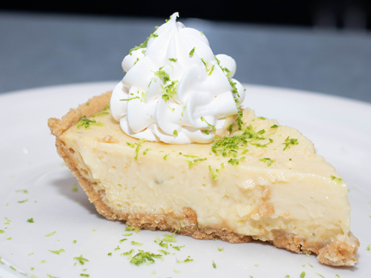 Order Key Lime Pie food online from Rockfish Seafood Grill store, Arlington on bringmethat.com
