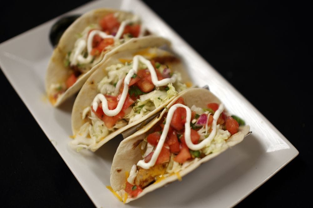 Order Fish Tacos Lunch - 3 Pieces food online from Wixom Station store, Wixom on bringmethat.com